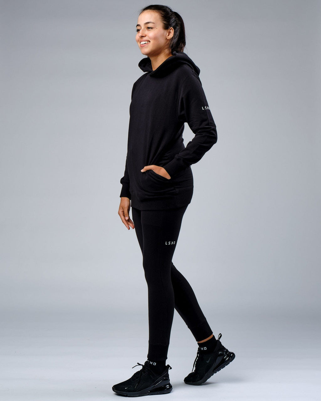 Model wearing Unisex Rival FLXFleece Training Fit Hoodie - Black
