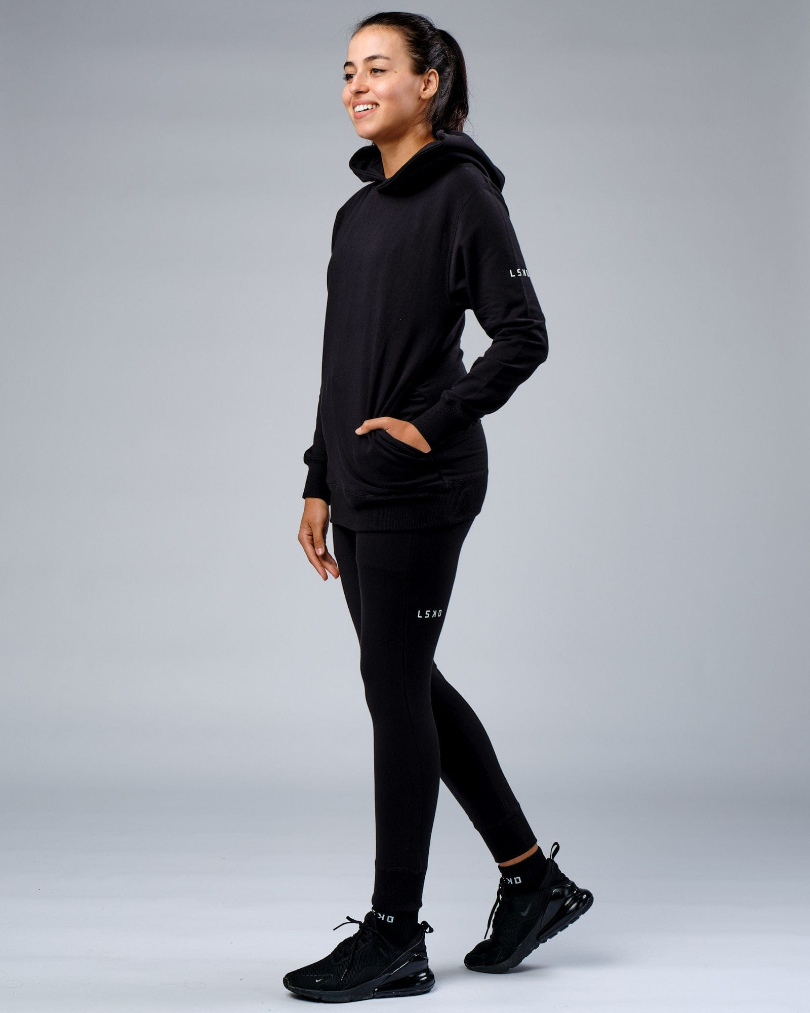Model wearing Unisex Rival FLXFleece Training Fit Hoodie - Black