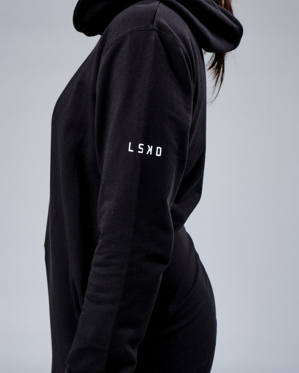 Model wearing Unisex Rival FLXFleece Training Fit Hoodie - Black