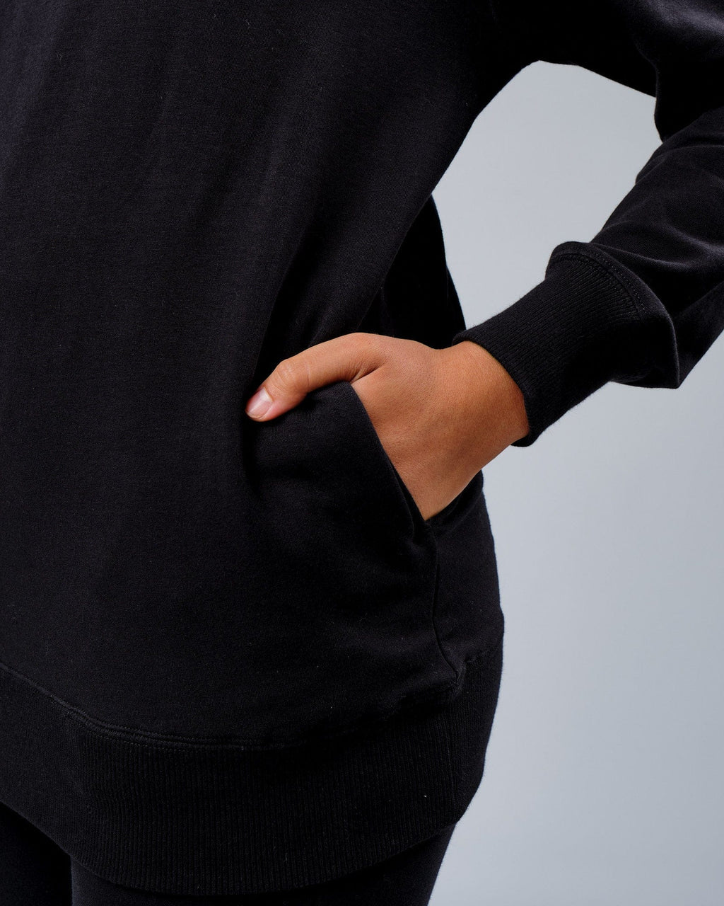 Model wearing Unisex Rival FLXFleece Training Fit Hoodie - Black