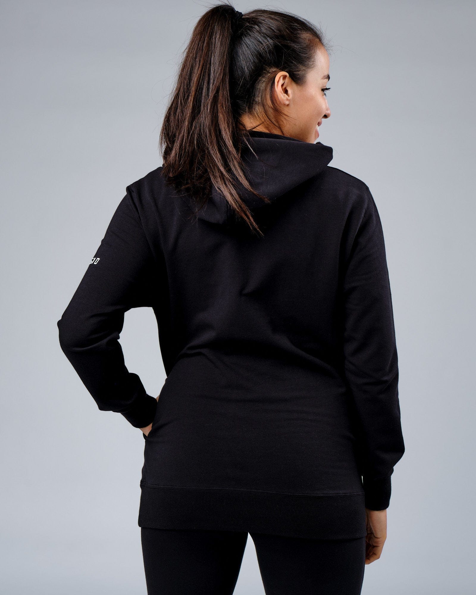 Model wearing Unisex Rival FLXFleece Training Fit Hoodie - Black