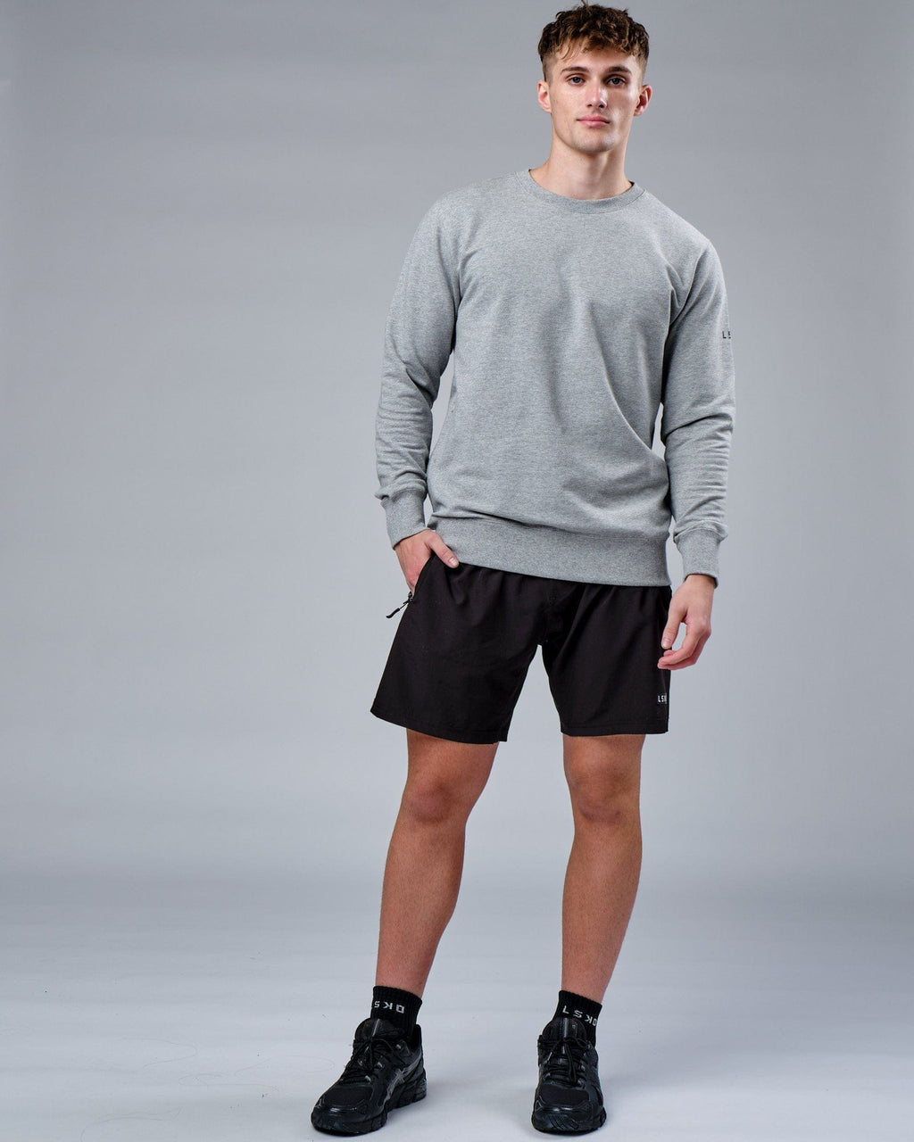 Model wearing Rival FLXFleece Training Fit Sweater - Lt Grey Marl