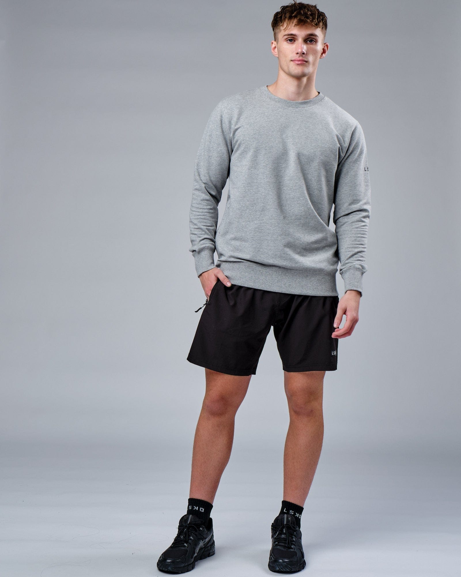 Model wearing Rival FLXFleece Training Fit Sweater - Lt Grey Marl
