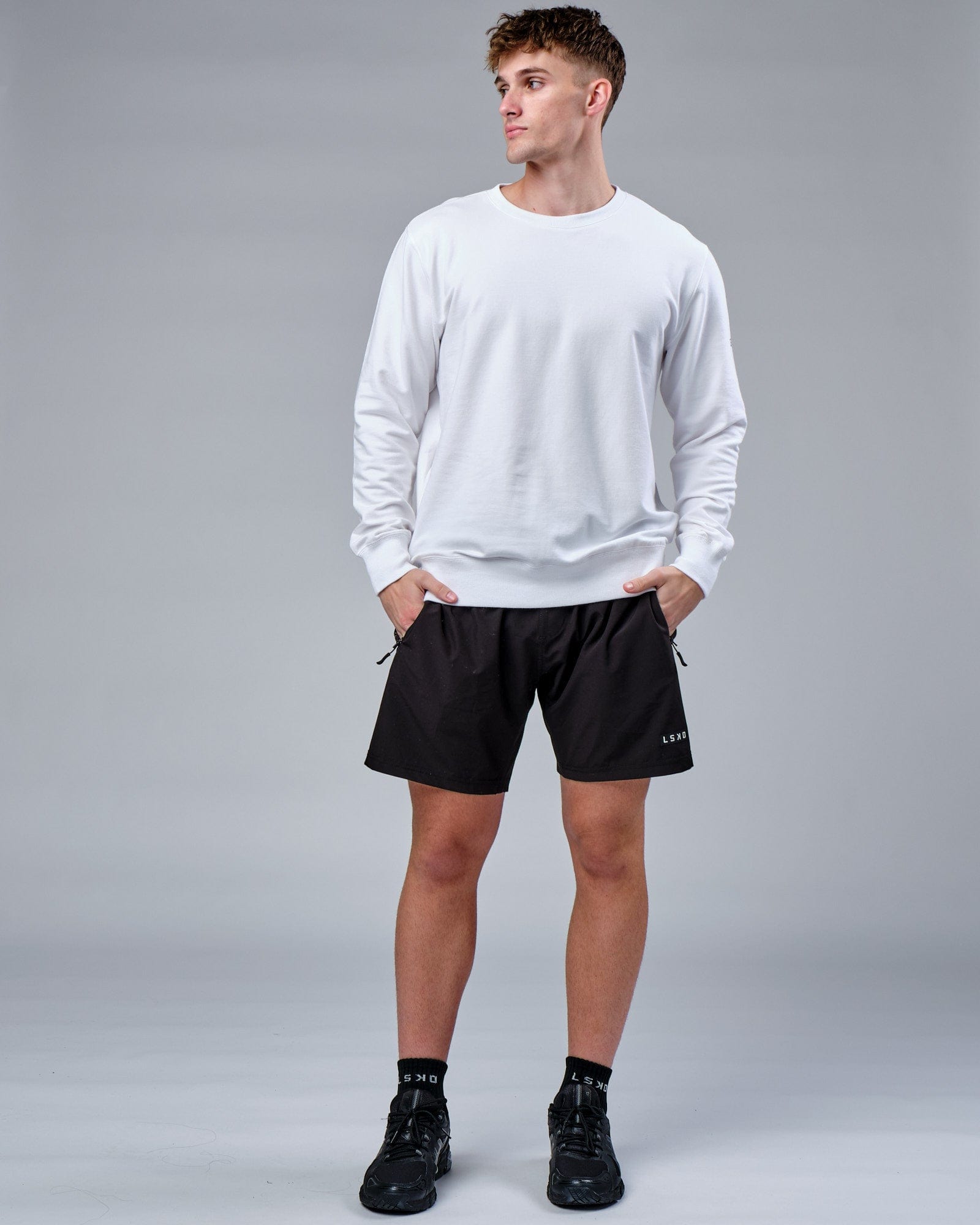 Model wearing Rival FLXFleece Training Fit Sweater - White