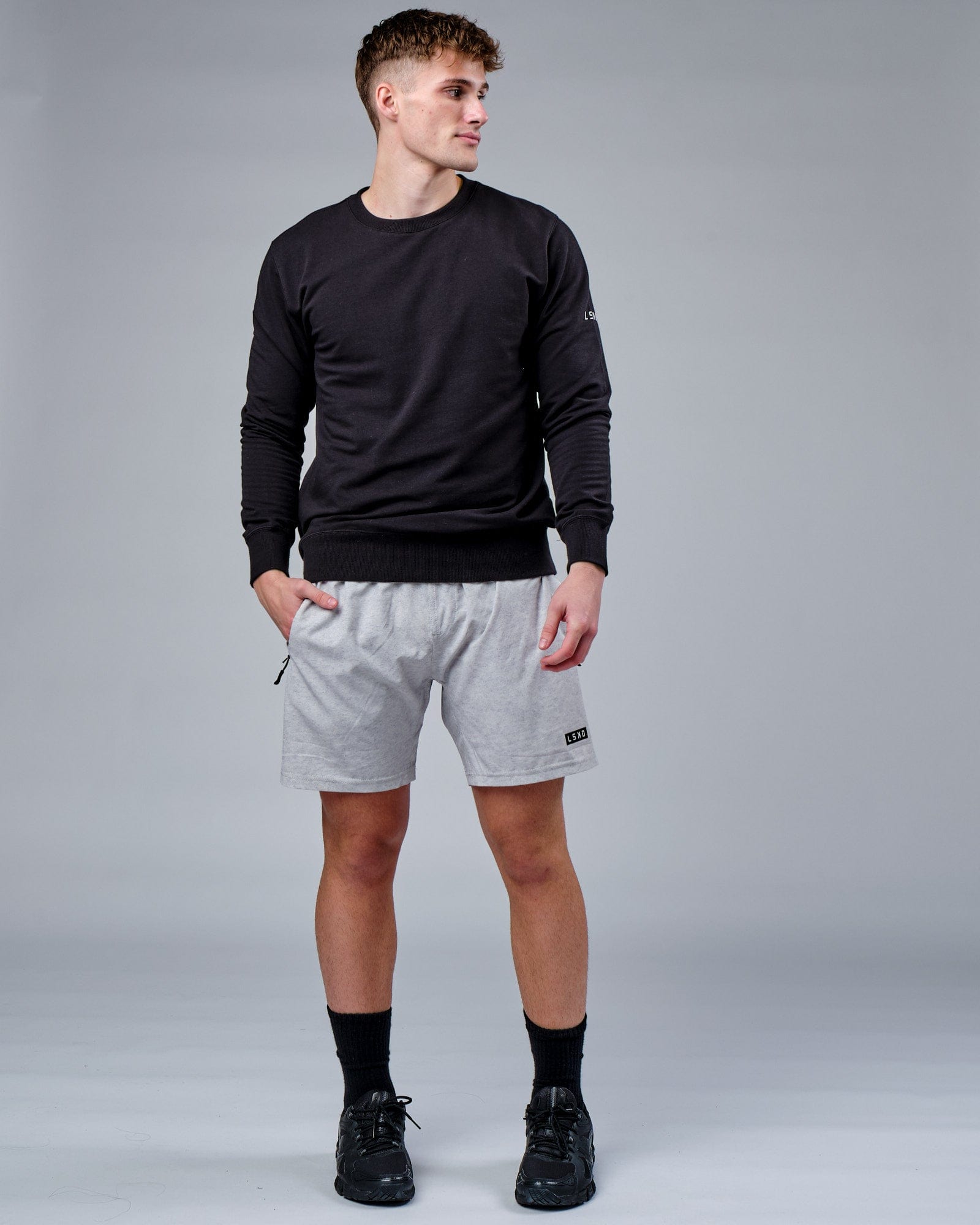 Model wearing Rival FLXFleece Training Fit Sweater - Black