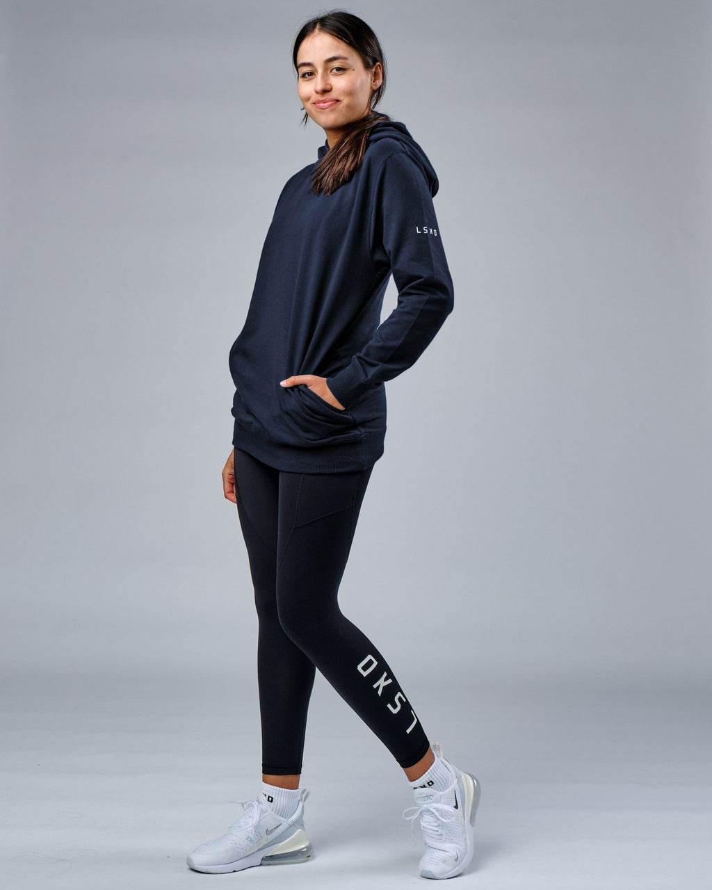 Model wearing Unisex Rival FLXFleece Training Fit Hoodie - Carbon