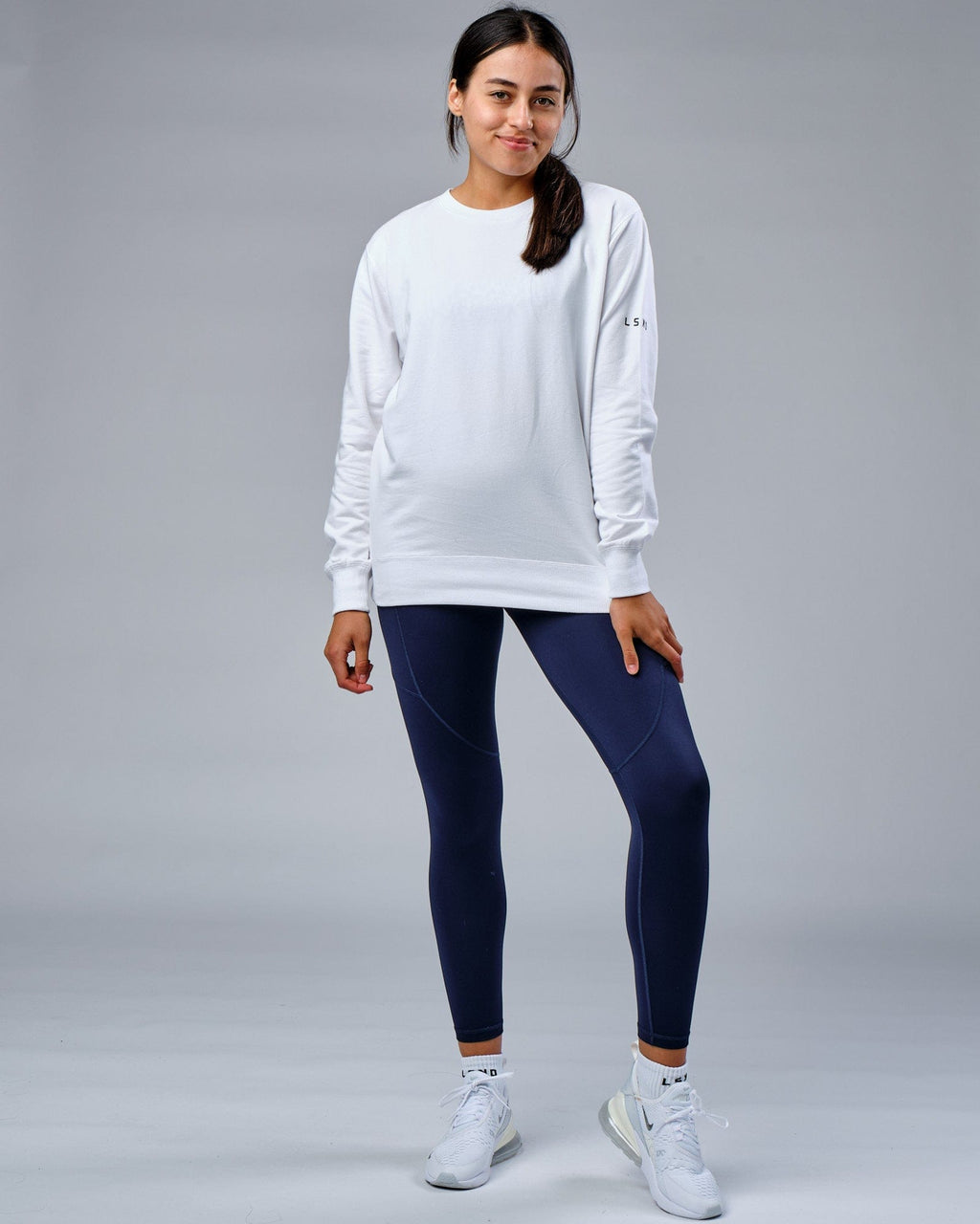 Model wearing Unisex Rival FLXFleece Training Fit Sweater - White
