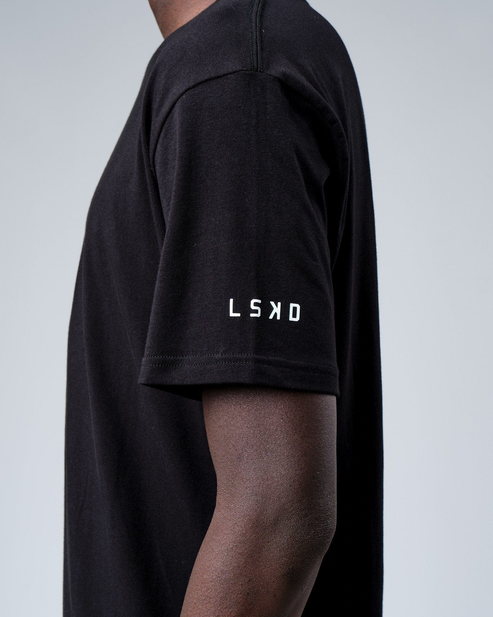 Model wearing Rival FLXCotton Training Fit Tee - Black