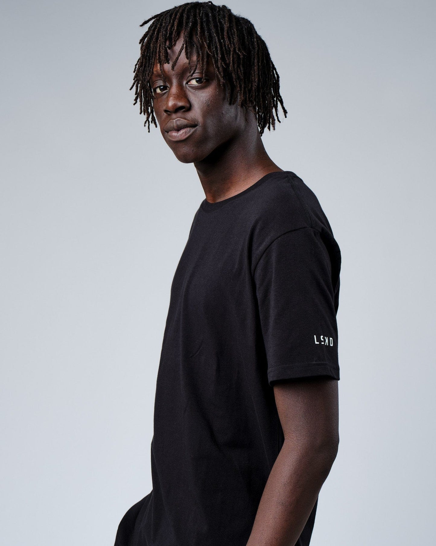 Model wearing Rival FLXCotton Training Fit Tee - Black