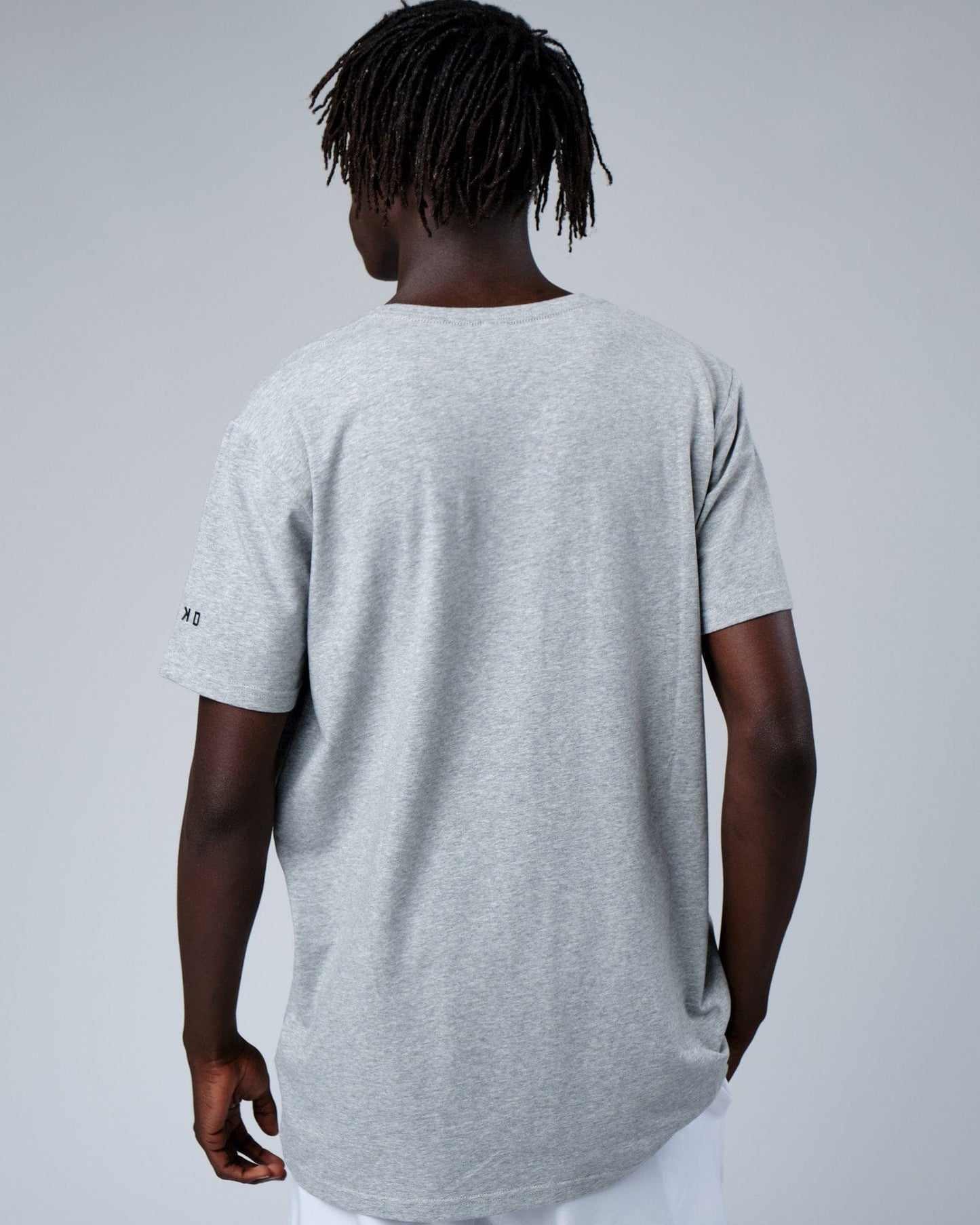 Model wearing Rival FLXCotton Training Fit Tee - Lt Grey Marl