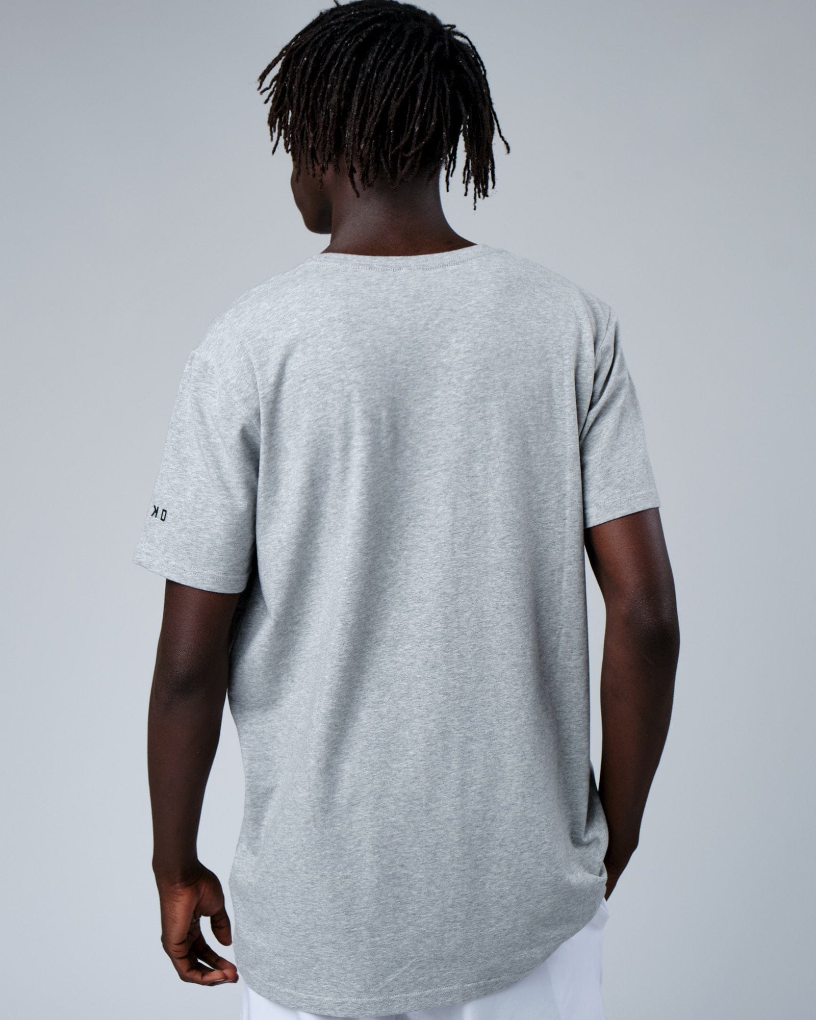 Model wearing Rival FLXCotton Training Fit Tee - Lt Grey Marl