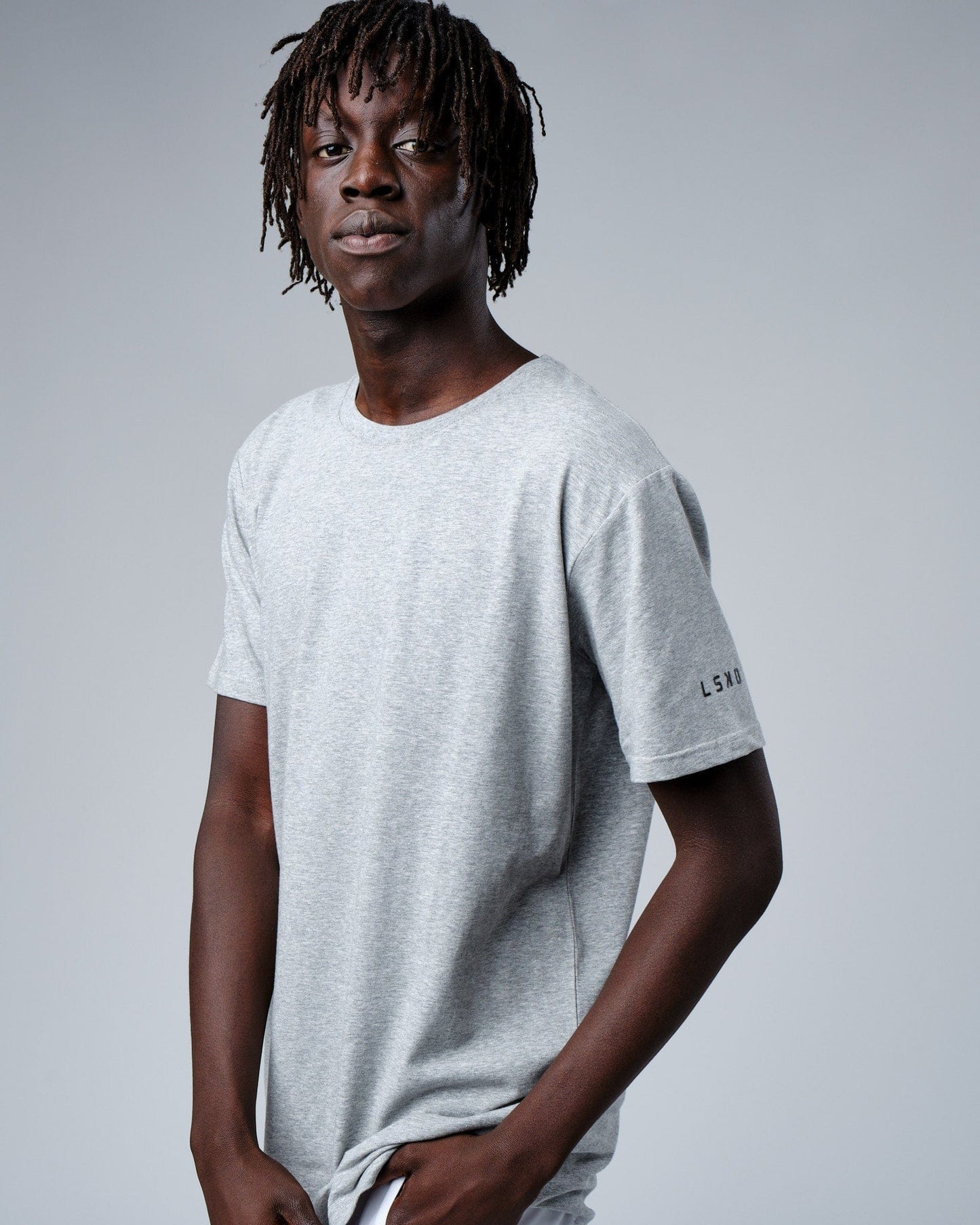 Model wearing Rival FLXCotton Training Fit Tee - Lt Grey Marl