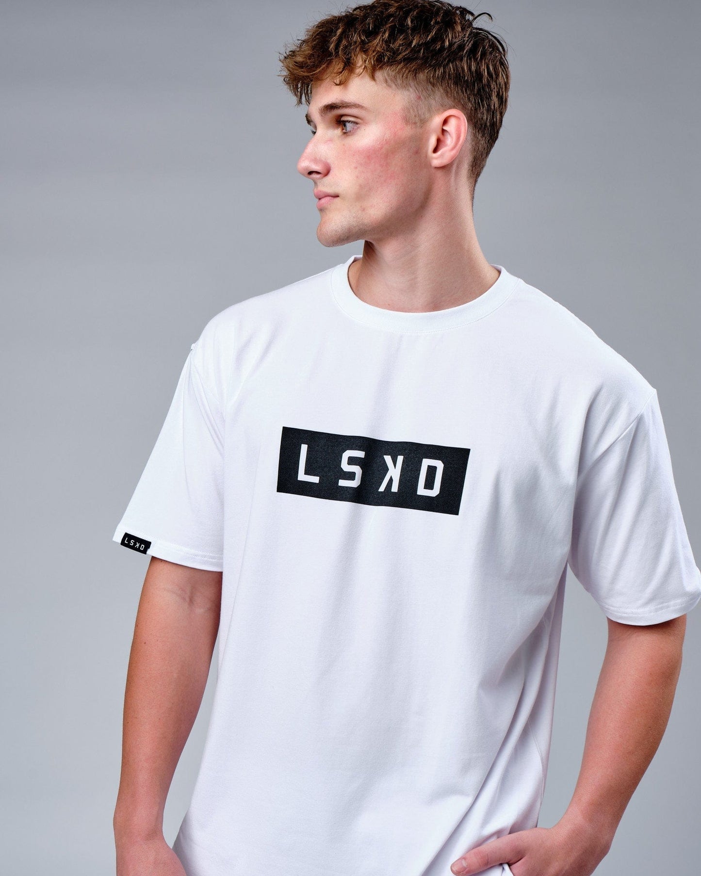 Model wearing Mood FLX Cotton Tee Oversize - White-Black