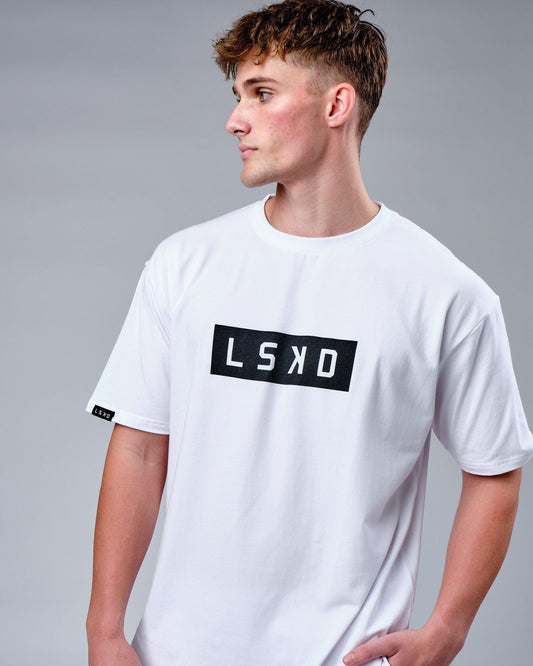 Model wearing Mood FLX Cotton Tee Oversize - White-Black