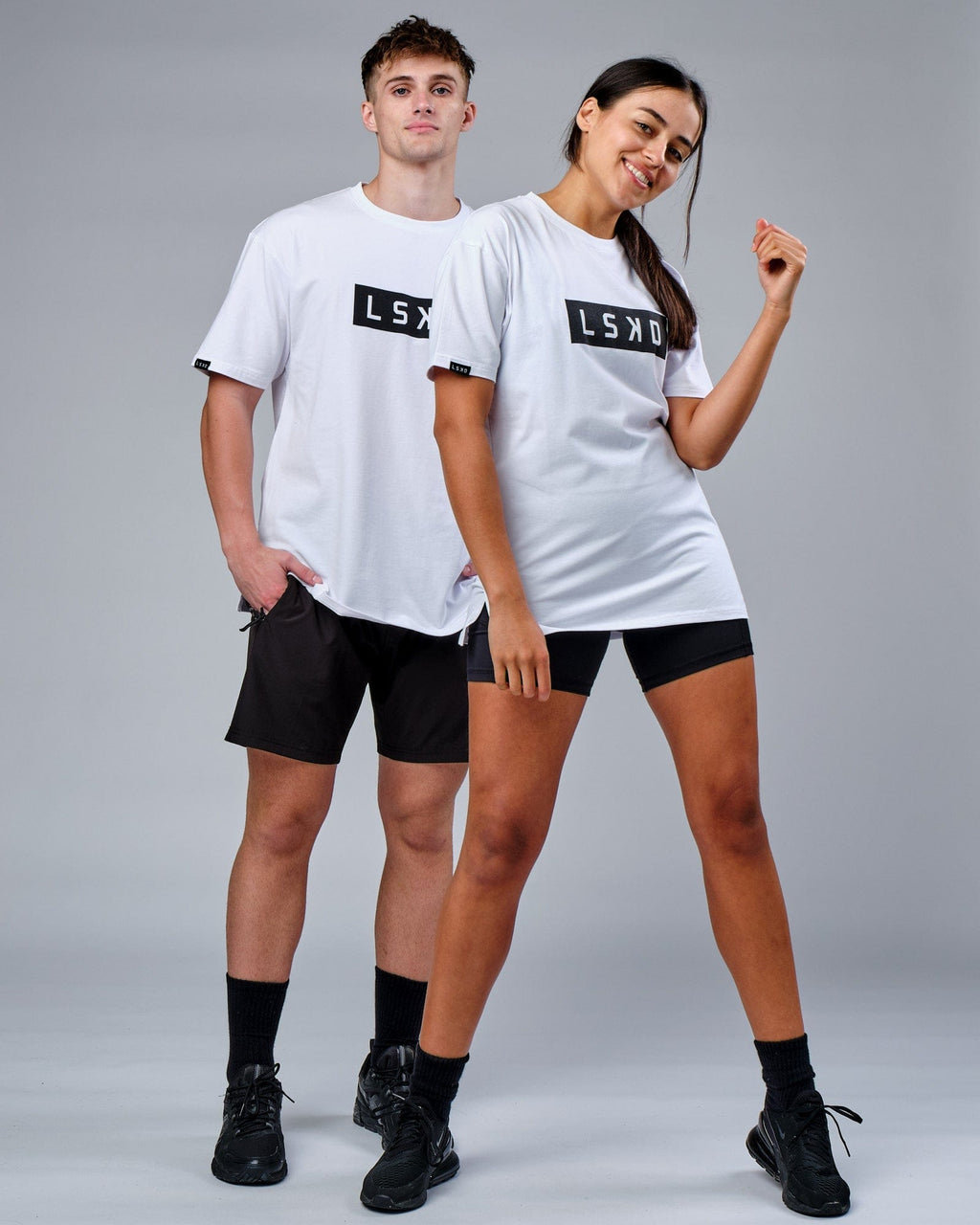 Model wearing Unisex Mood FLXCotton Tee Oversize - White-Black