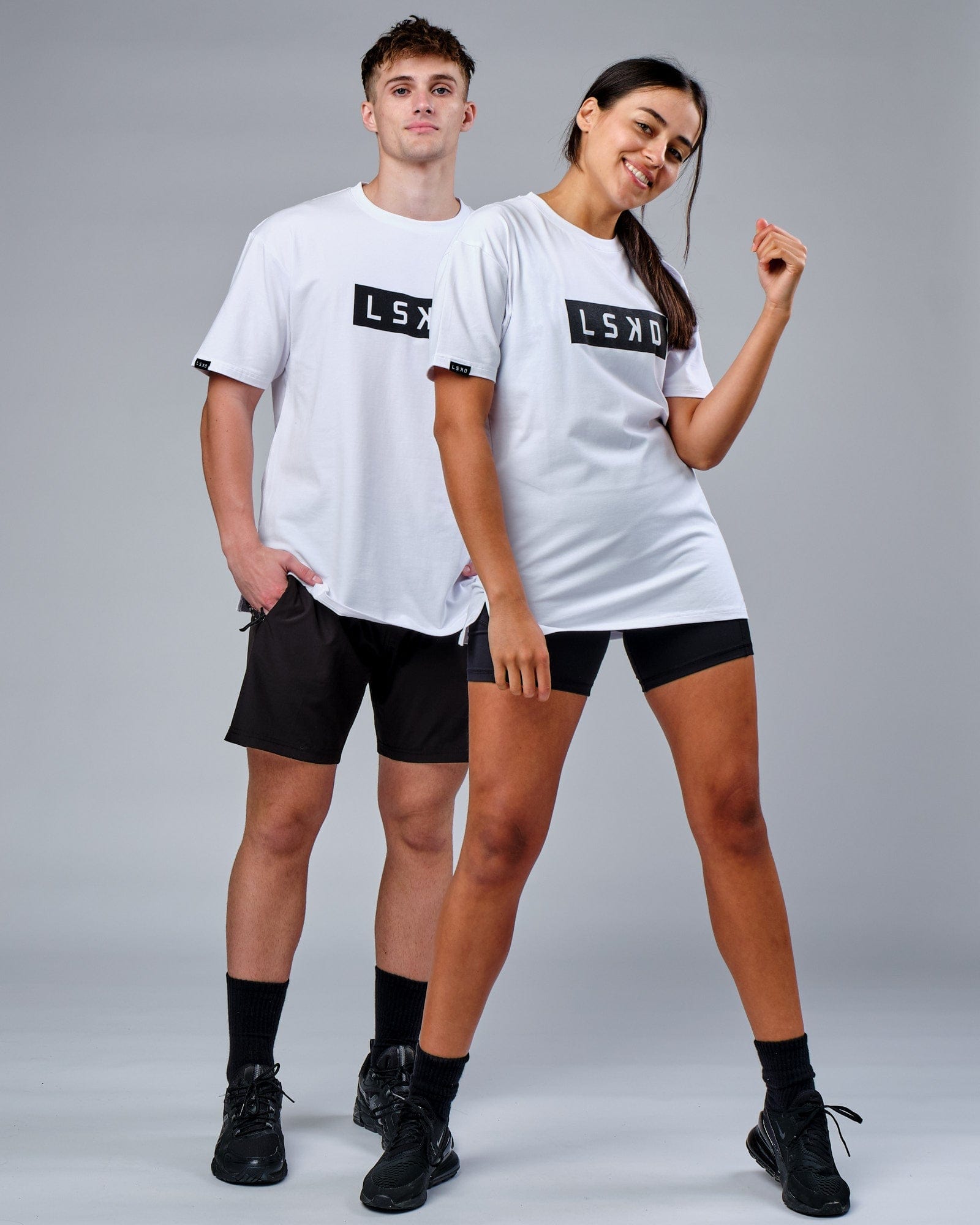 Model wearing Unisex Mood FLXCotton Tee Oversize - White-Black