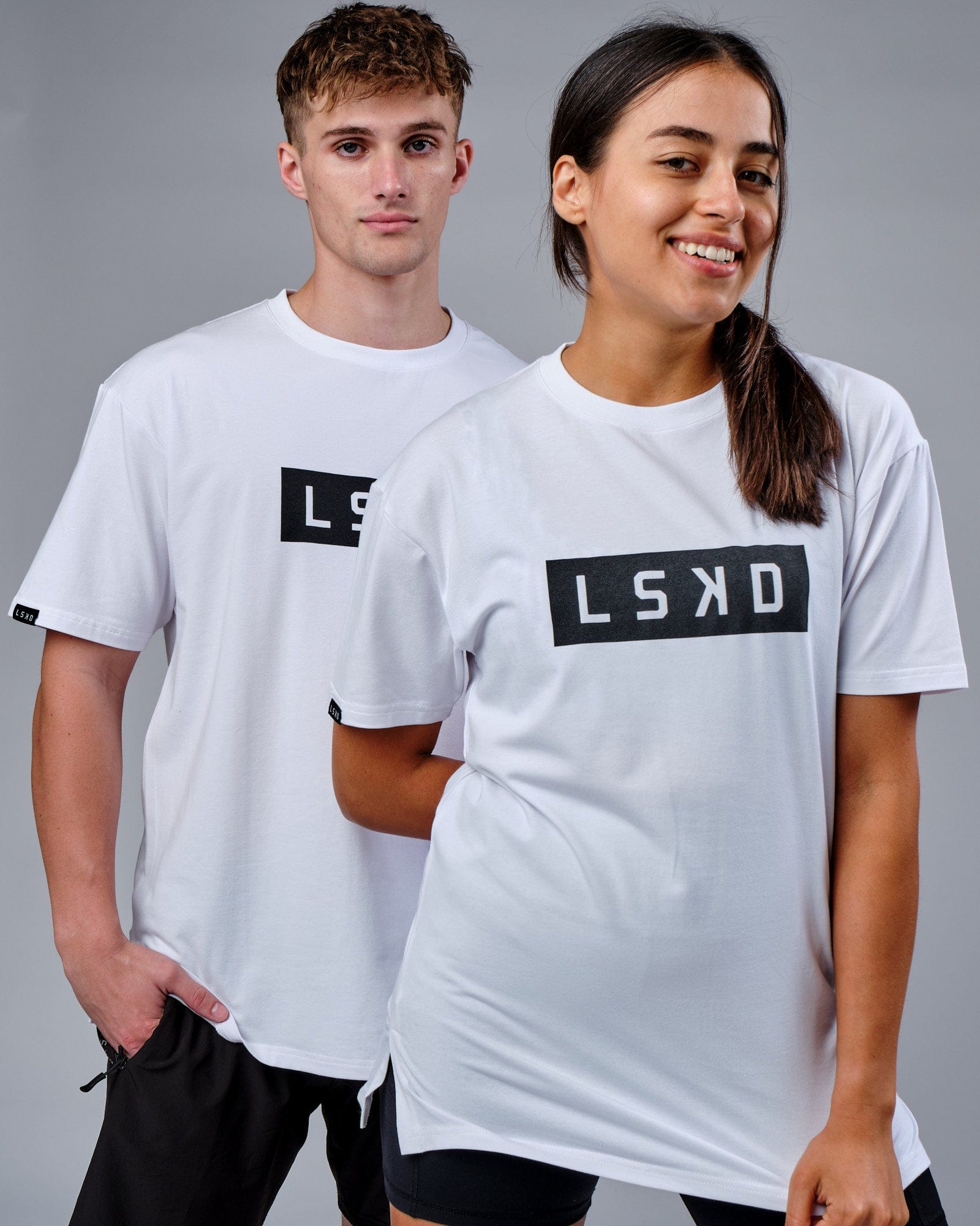 Model wearing Unisex Mood FLXCotton Tee Oversize - White-Black