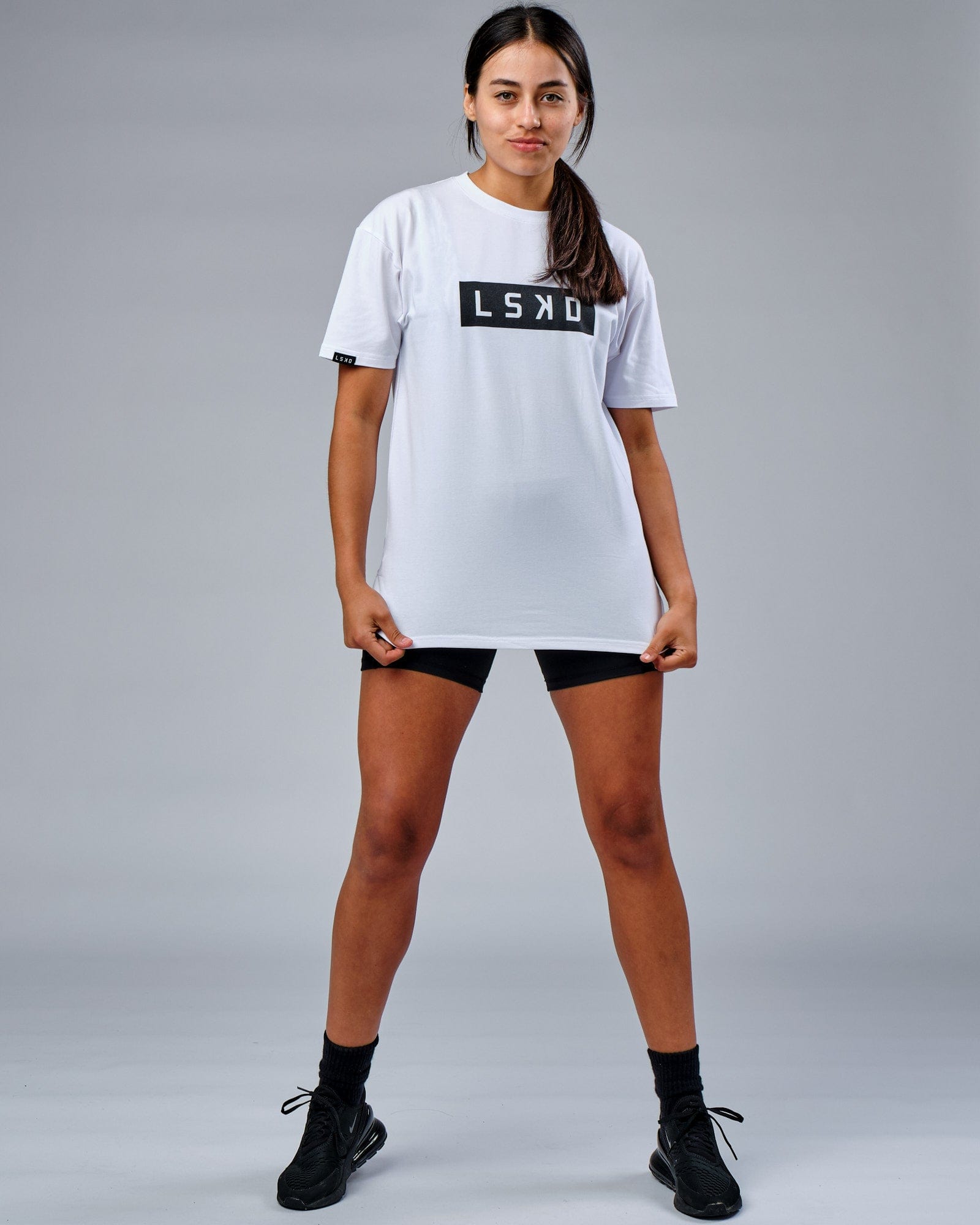 Model wearing Unisex Mood FLXCotton Tee Oversize - White-Black