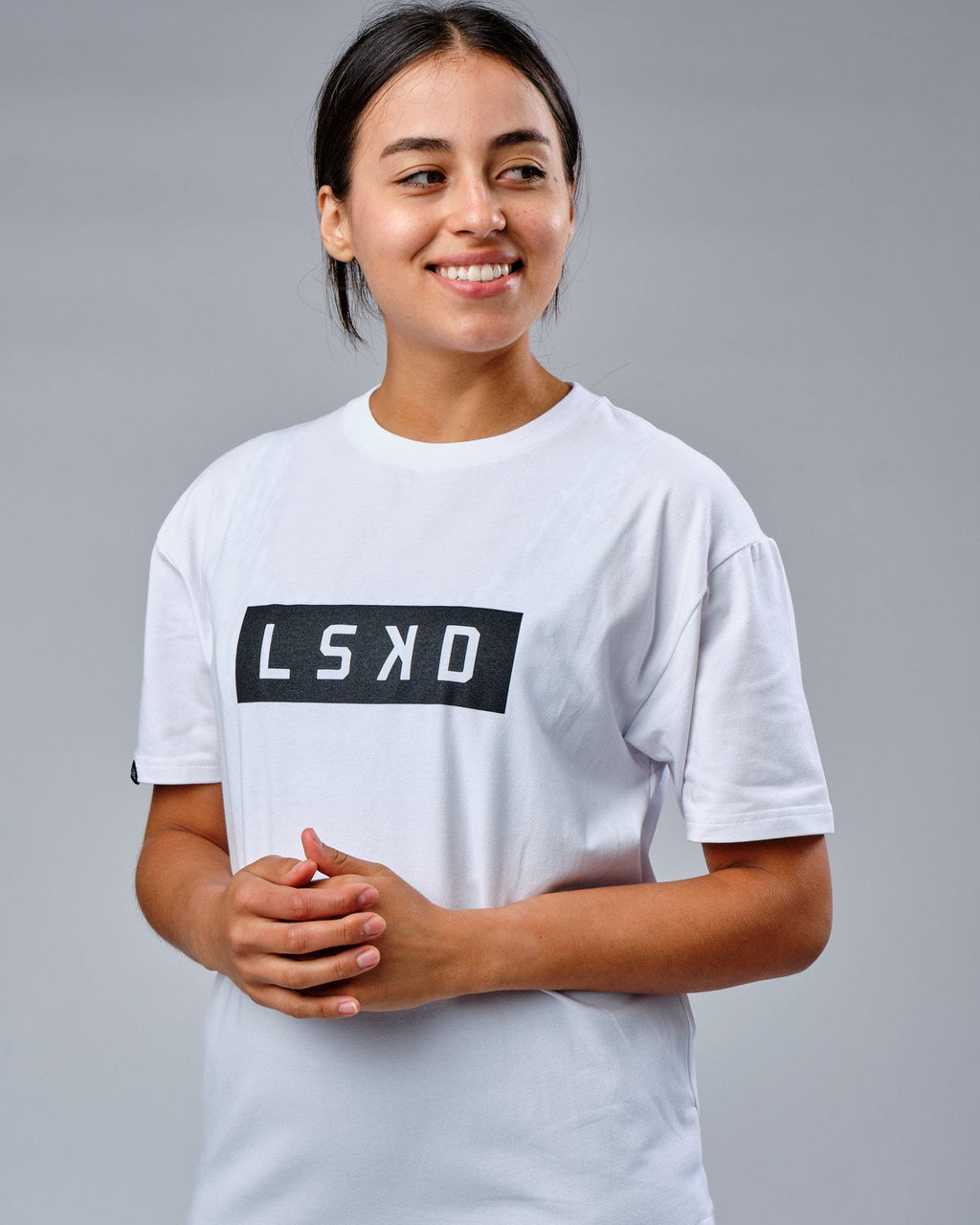 Model wearing Unisex Mood FLXCotton Tee Oversize - White-Black
