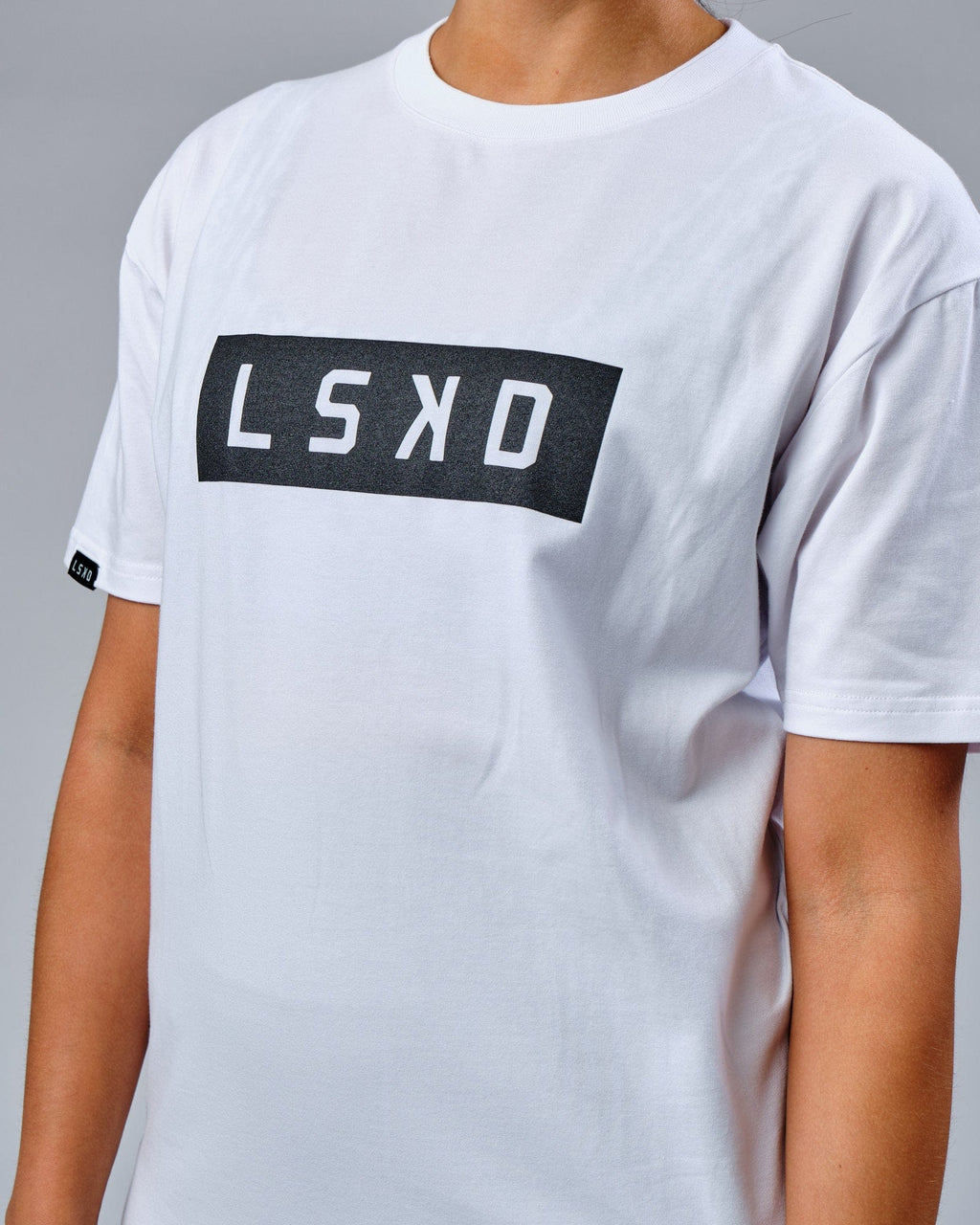 Model wearing Unisex Mood FLXCotton Tee Oversize - White-Black