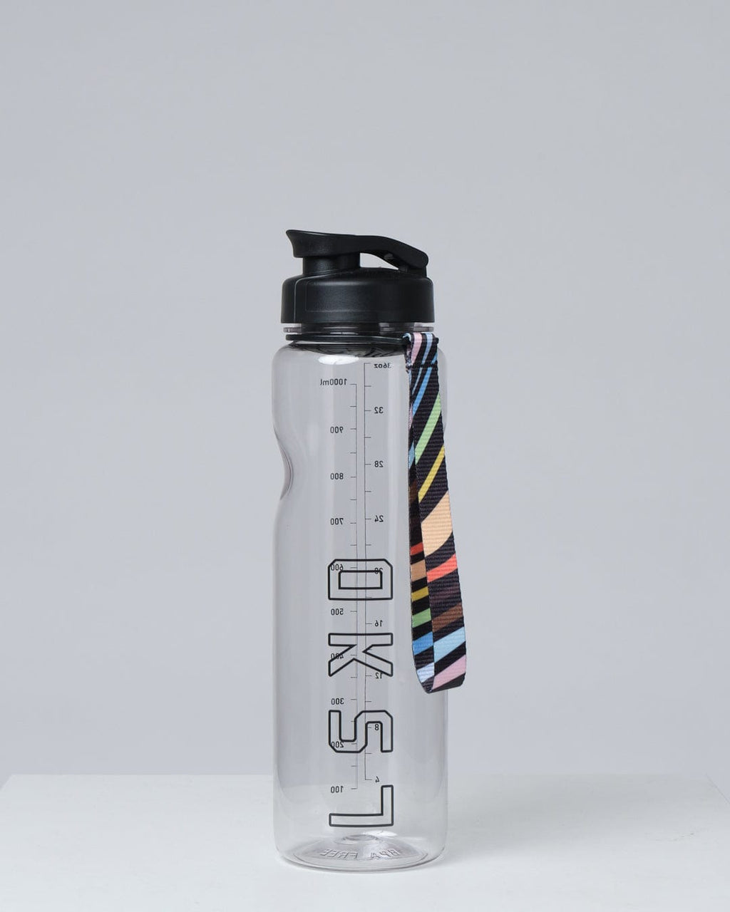 Model wearing Progress 1L Bottle - Clear-Black