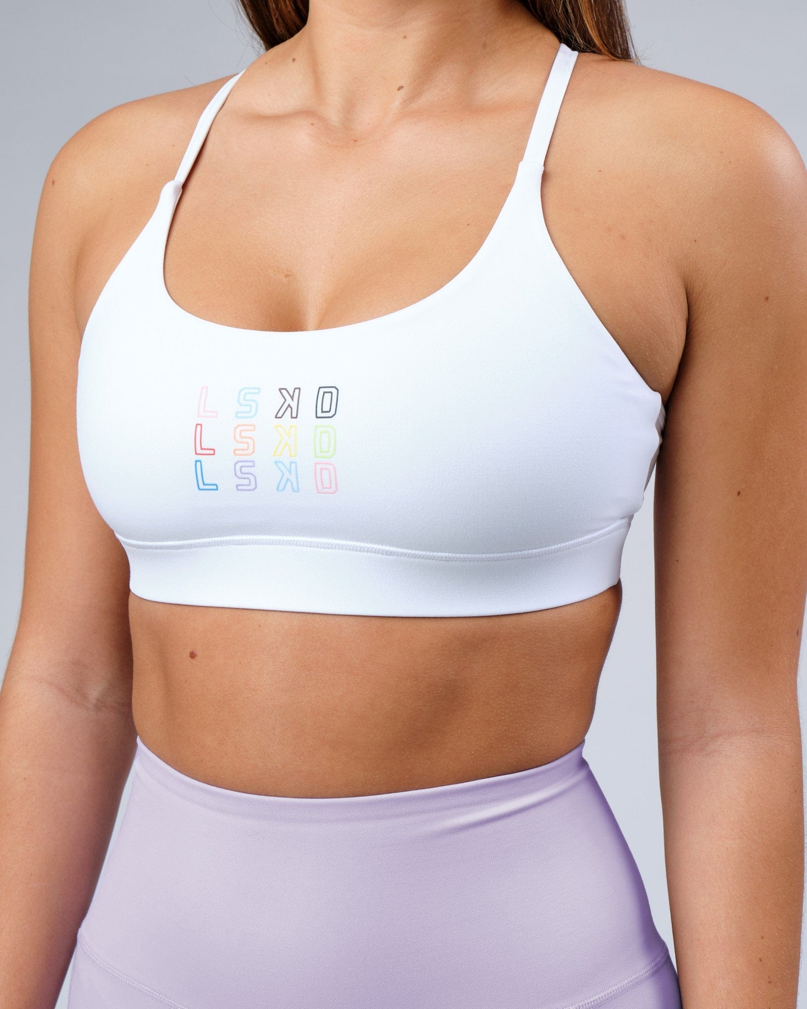Model wearing Progress Recycled Sports Bra - White