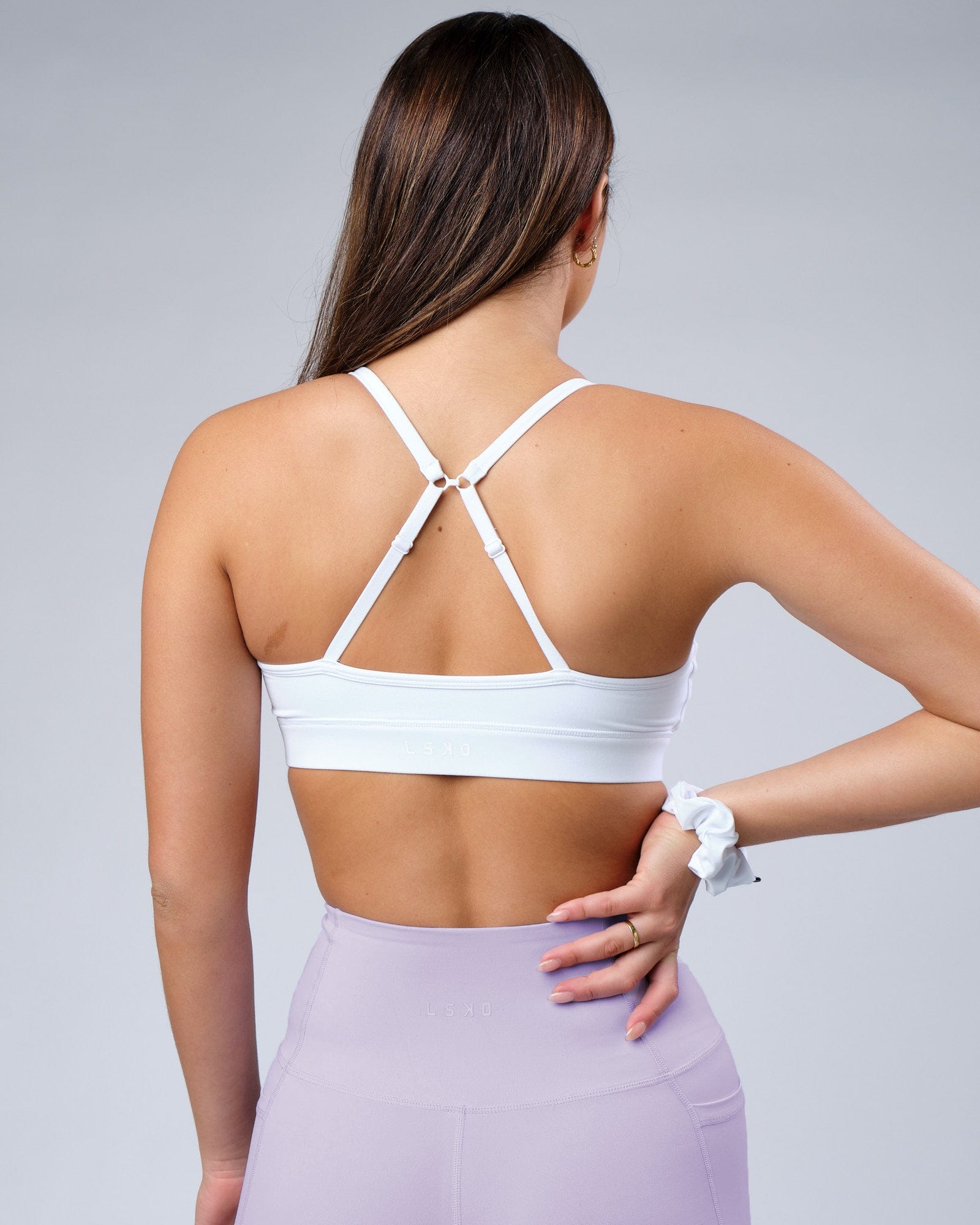 Model wearing Progress Recycled Sports Bra - White