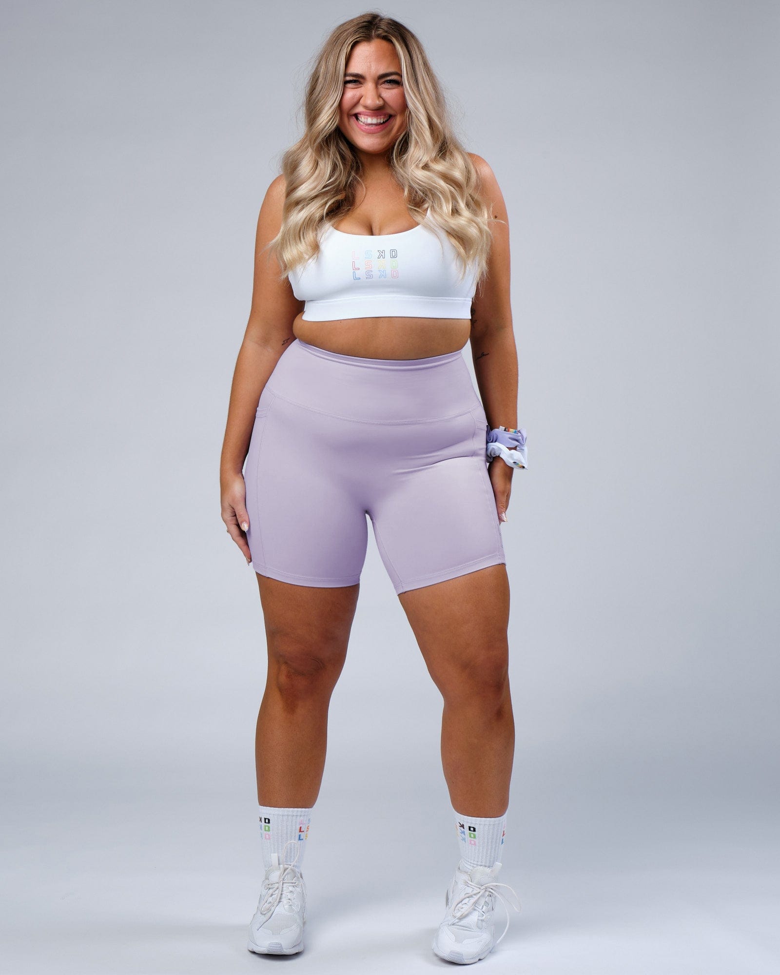 Model wearing Progress Recycled Mid Short Tight - Lavender