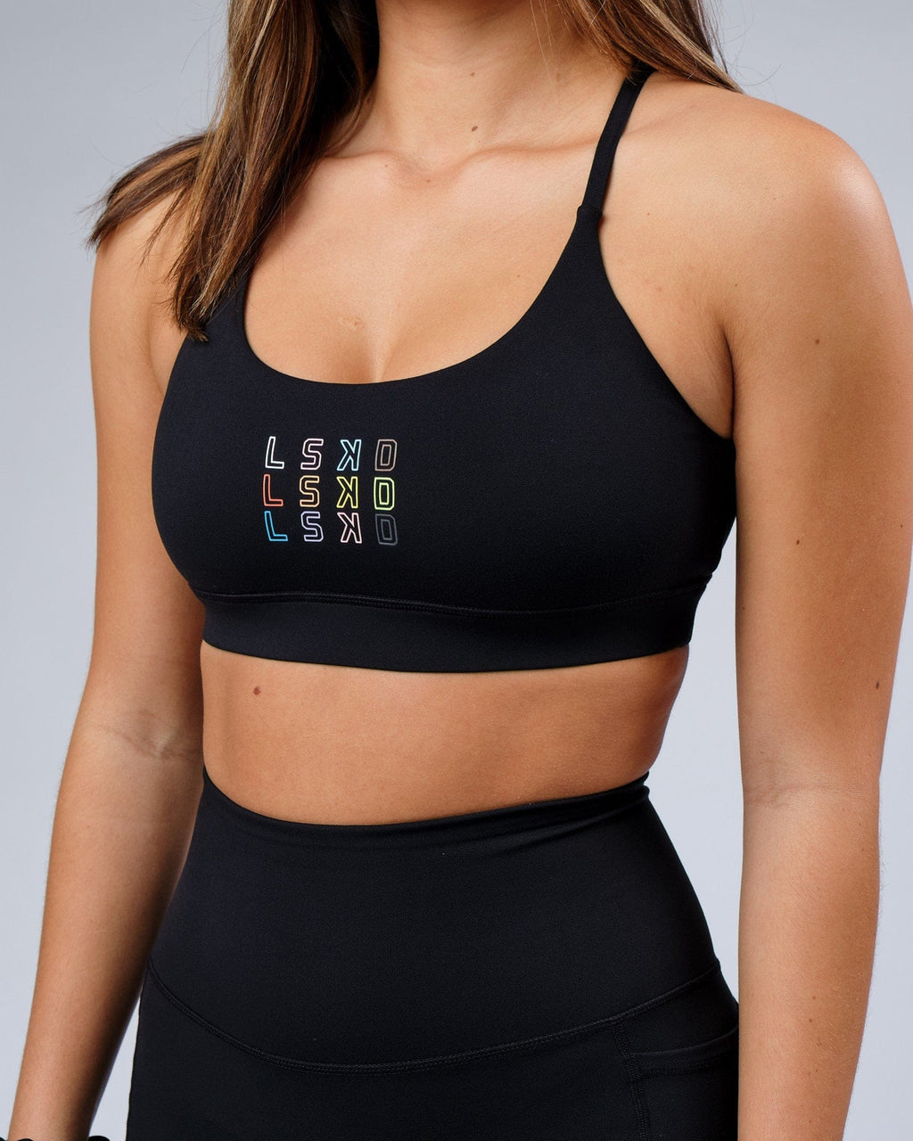 Model wearing Progress Sports Bra - Black
