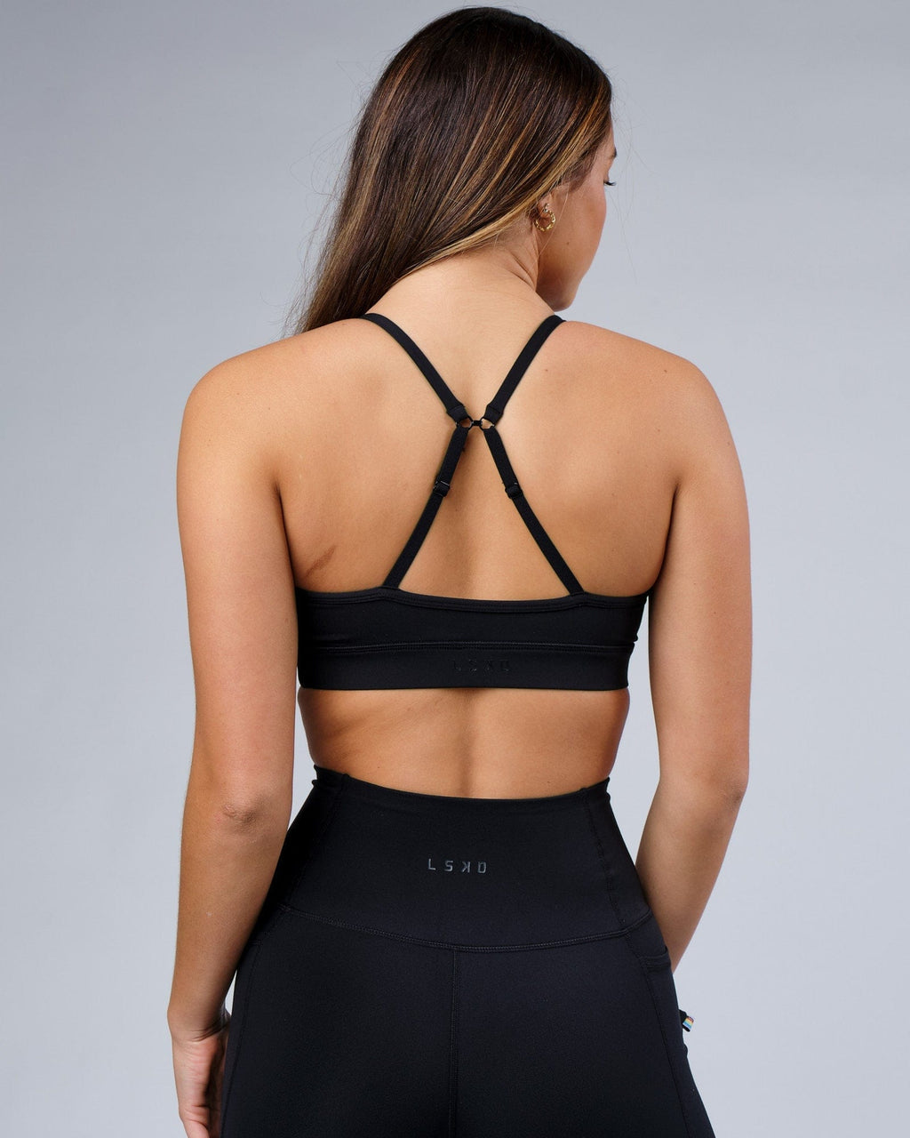 Model wearing Progress Sports Bra - Black