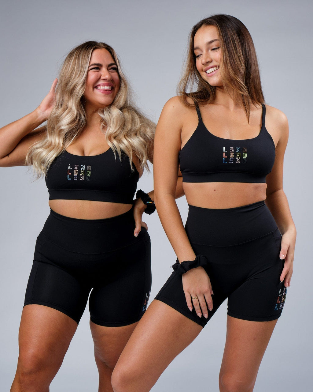 Model wearing Progress Mid Short Tight - Black