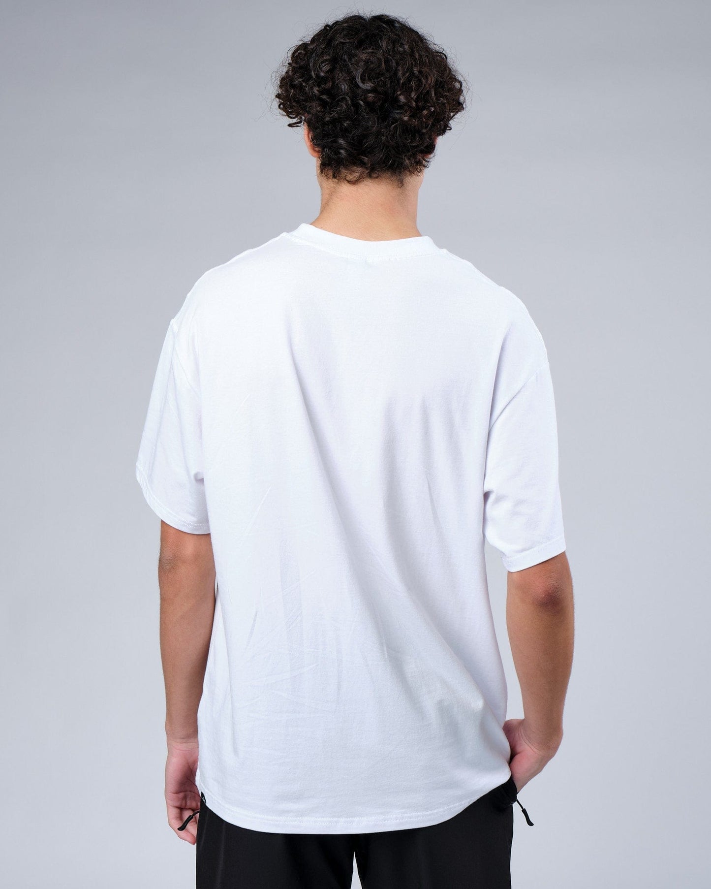 Model wearing Progress FLXCotton Tee Oversize - White