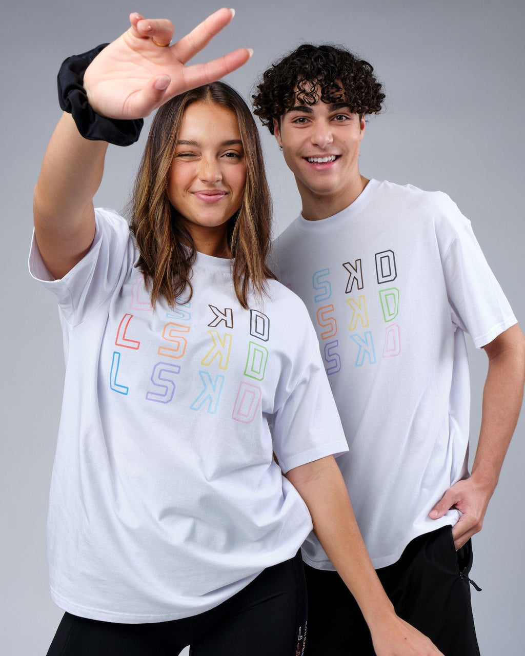 Model wearing Unisex Progress FLXCotton Tee Oversize - White