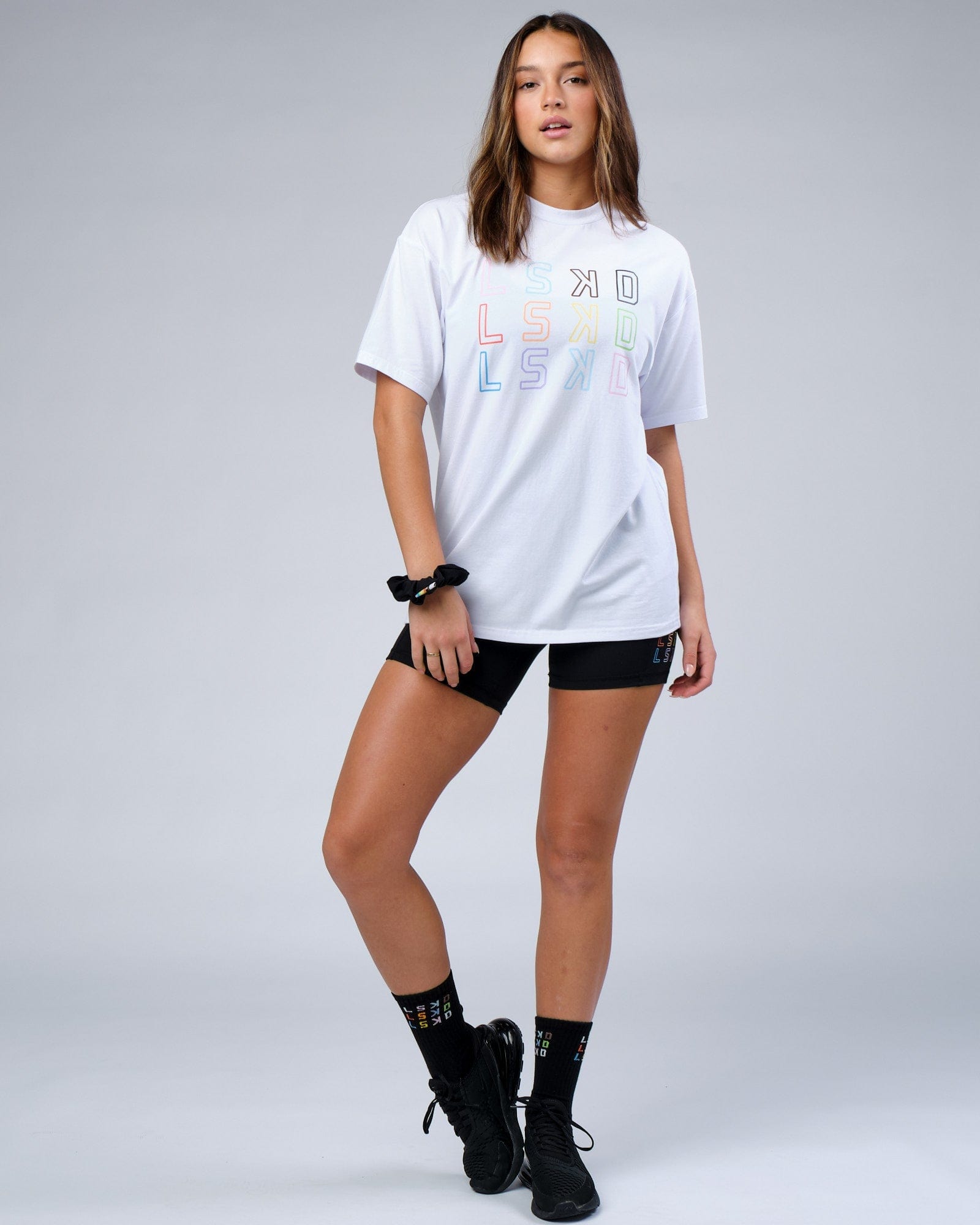 Model wearing Unisex Progress FLXCotton Tee Oversize - White