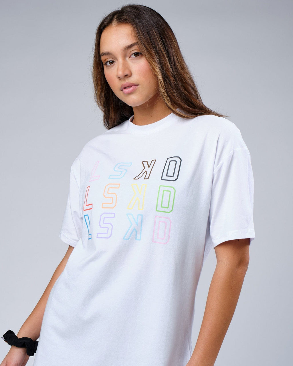 Model wearing Unisex Progress FLXCotton Tee Oversize - White