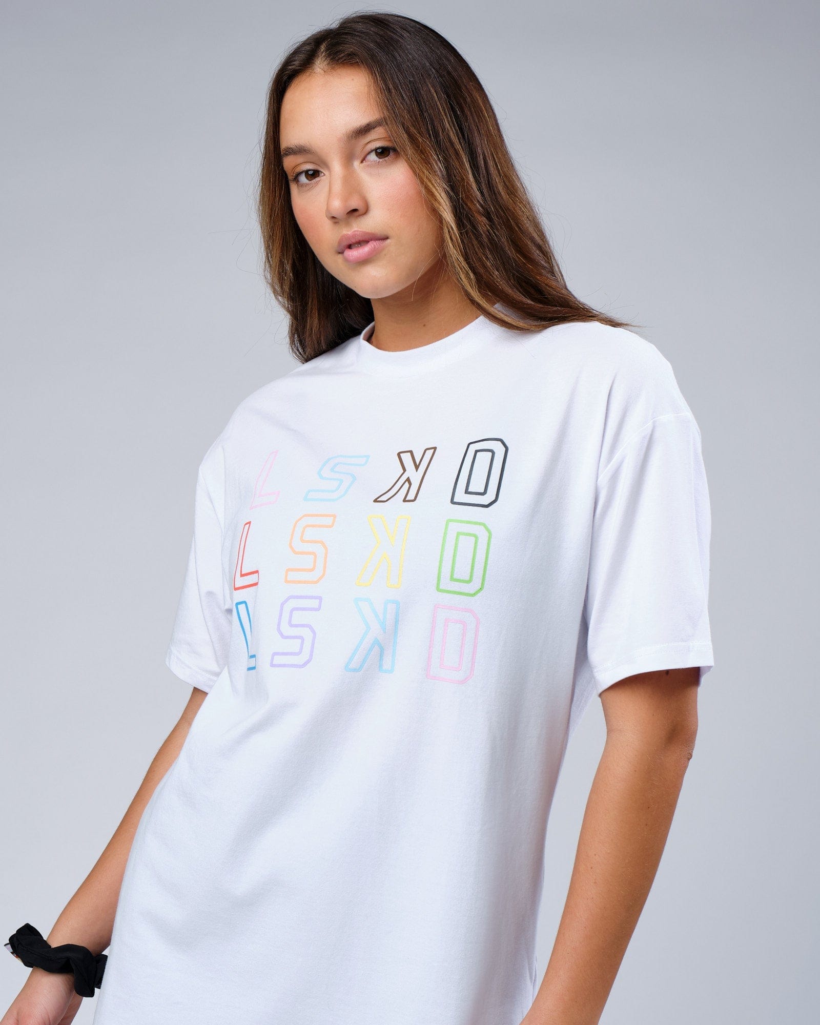 Model wearing Unisex Progress FLXCotton Tee Oversize - White