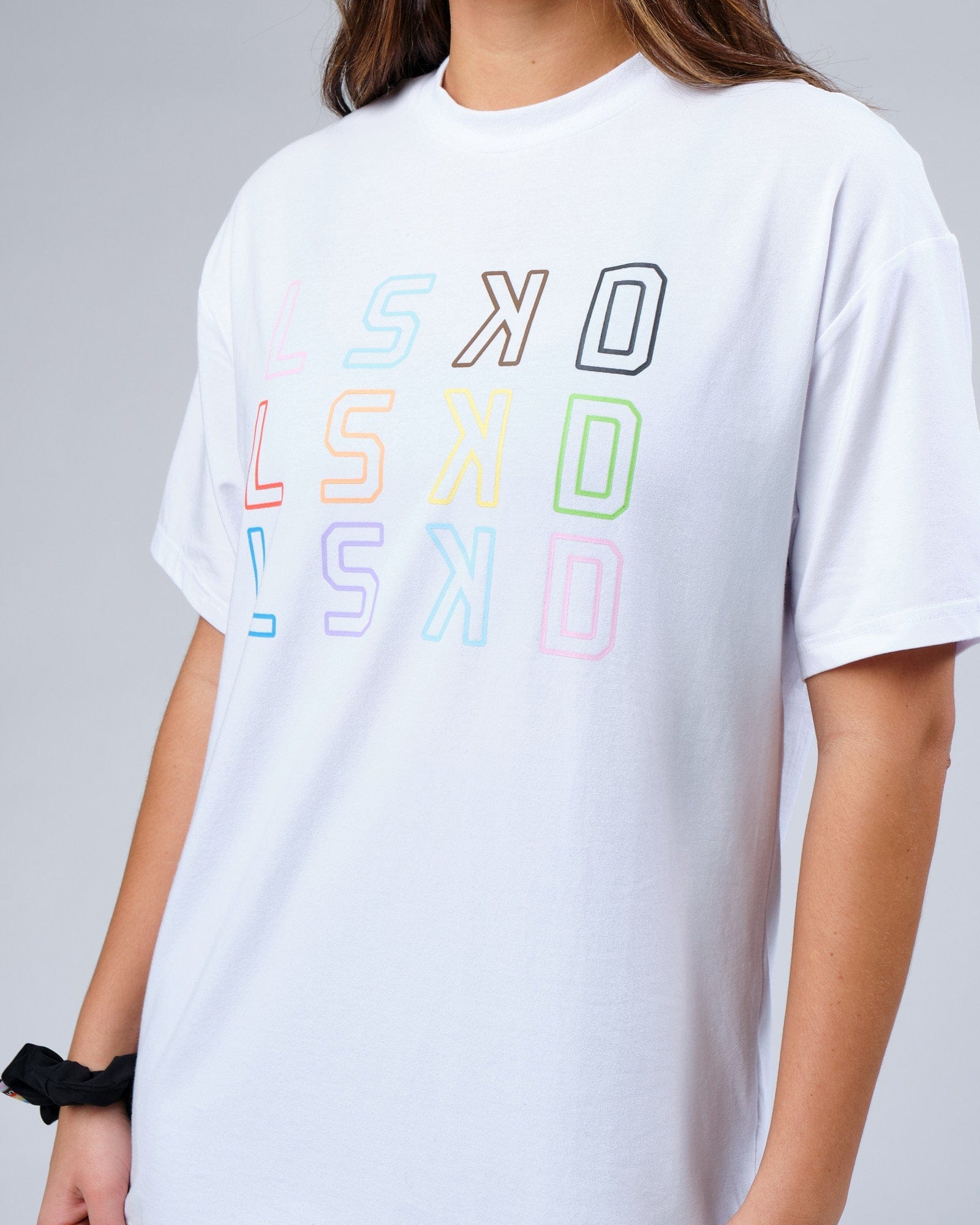 Model wearing Unisex Progress FLXCotton Tee Oversize - White