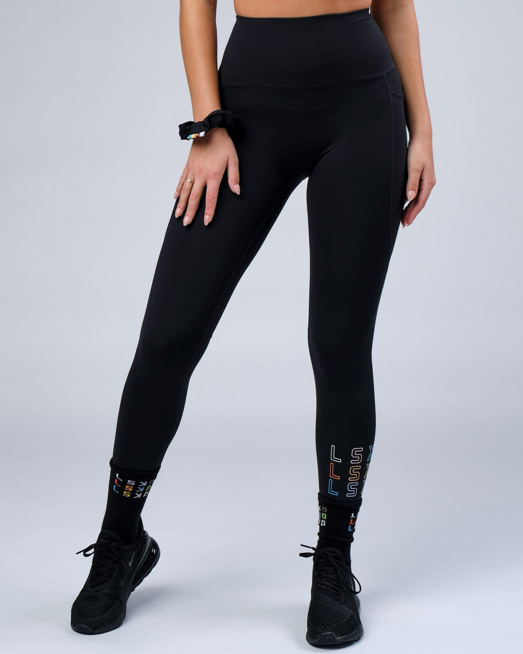Model wearing Progress 7/8 Length Tight - Black