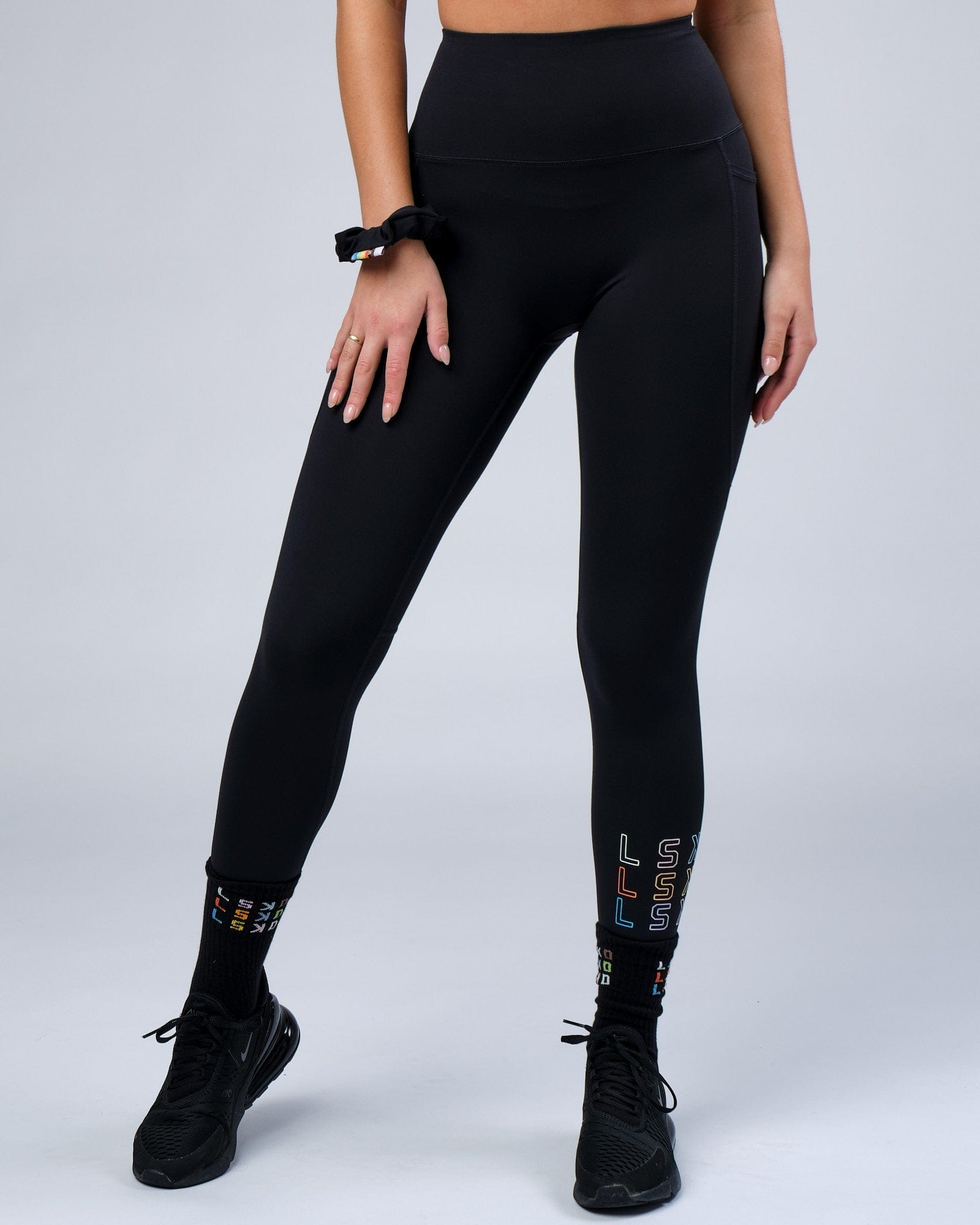 Model wearing Progress 7/8 Length Tight - Black