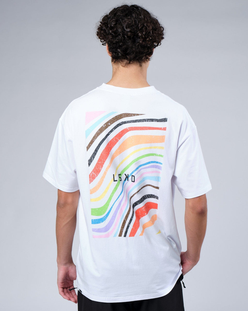 Model wearing Unity FLXCotton Tee Oversize - White