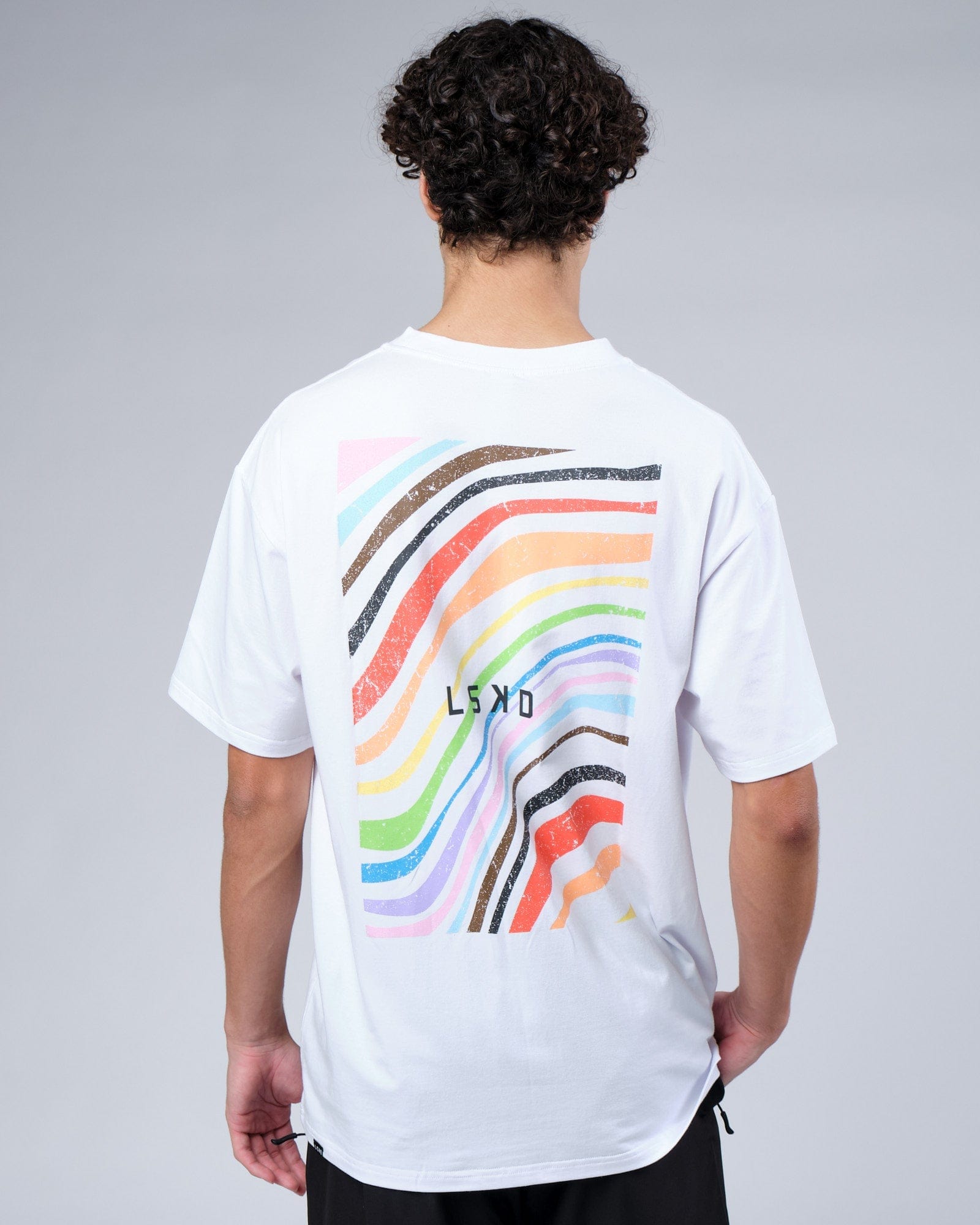 Model wearing Unity FLXCotton Tee Oversize - White