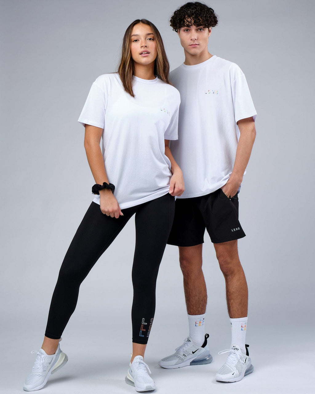 Model wearing Unisex Unity FLXCotton Tee Oversize - White