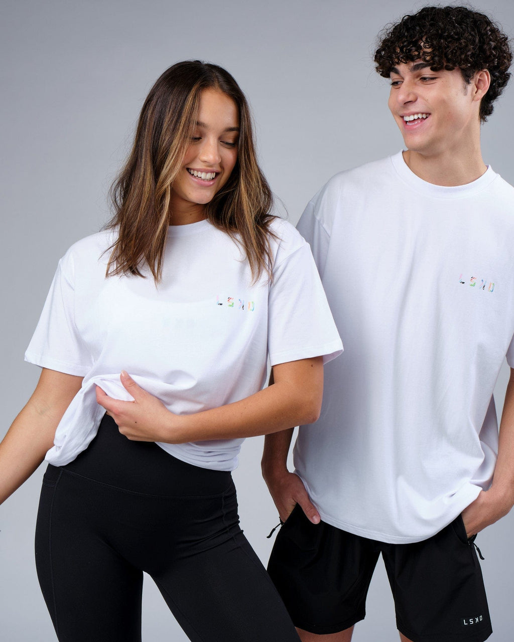 Model wearing Unisex Unity FLXCotton Tee Oversize - White