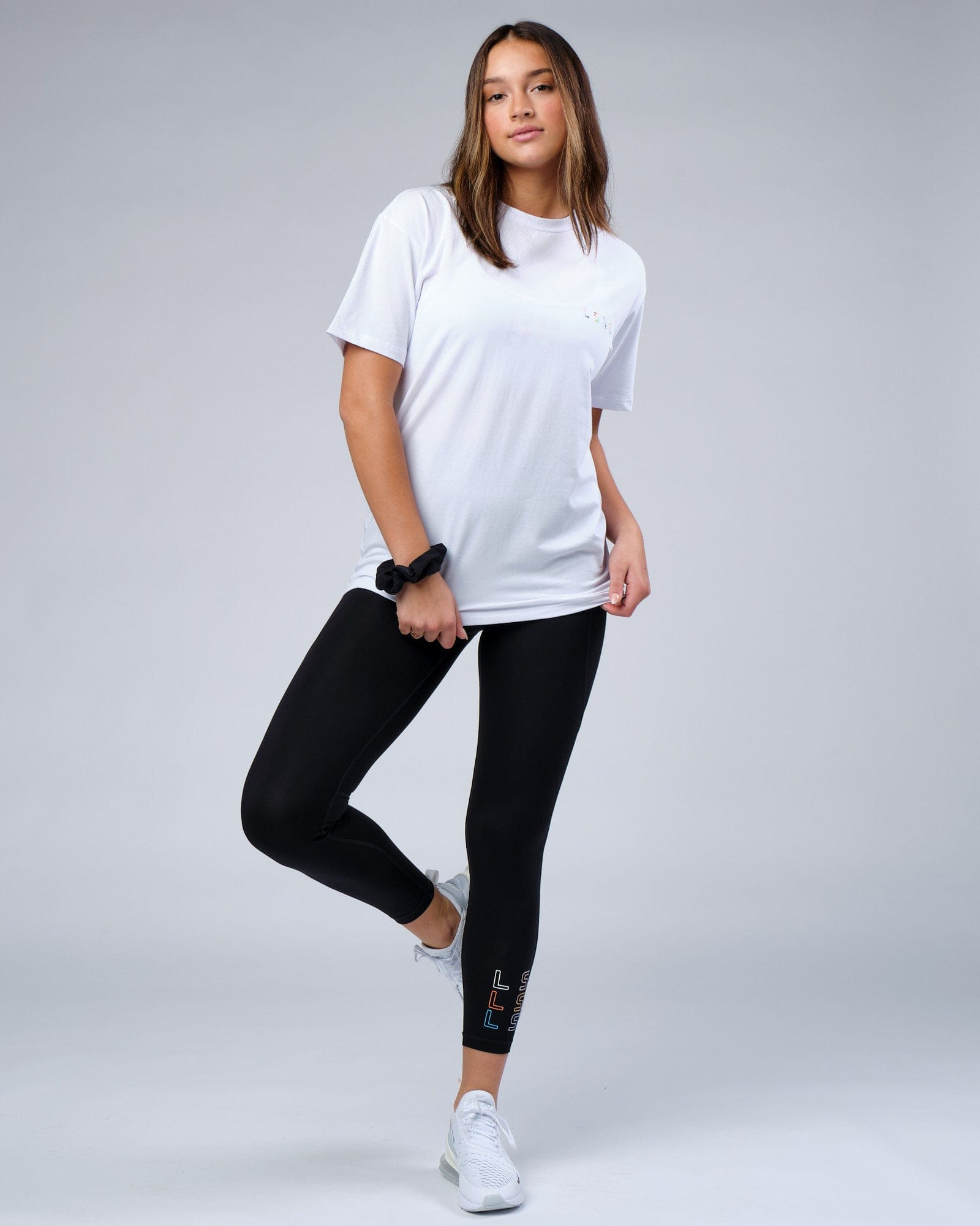 Model wearing Unisex Unity FLXCotton Tee Oversize - White