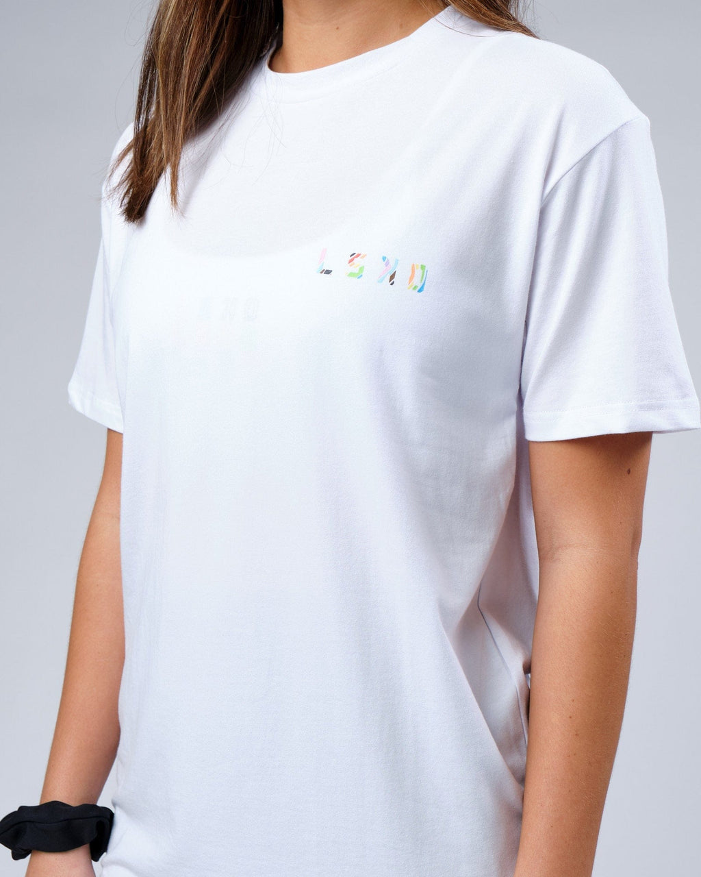 Model wearing Unisex Unity FLXCotton Tee Oversize - White