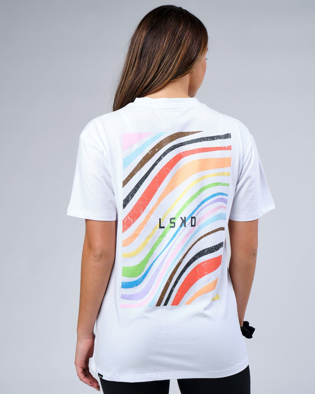 Model wearing Unisex Unity FLXCotton Tee Oversize - White