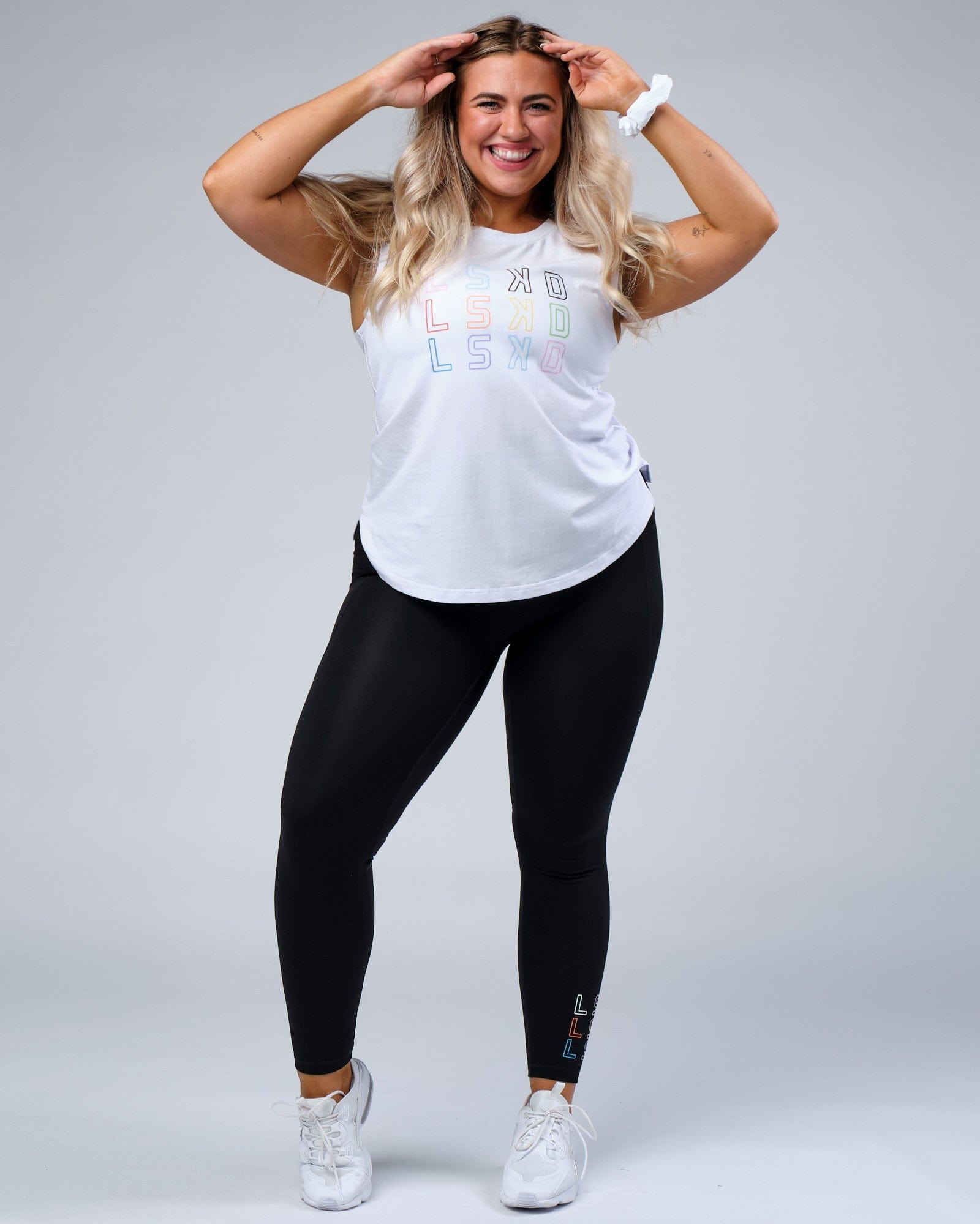 Model wearing Progress FLXCotton Tank - White