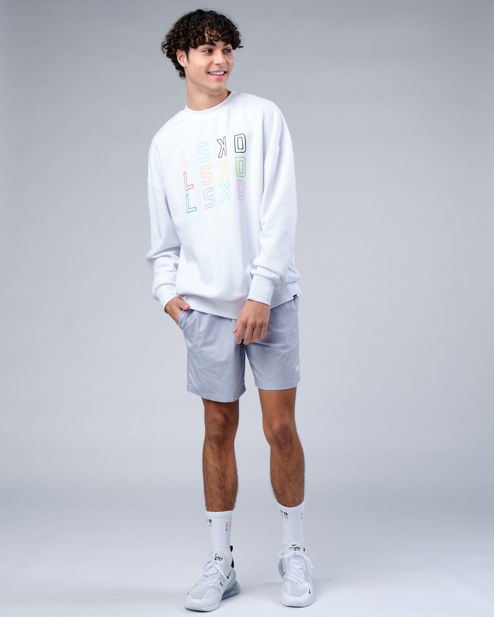 Model wearing Progress Sweater Oversize - White
