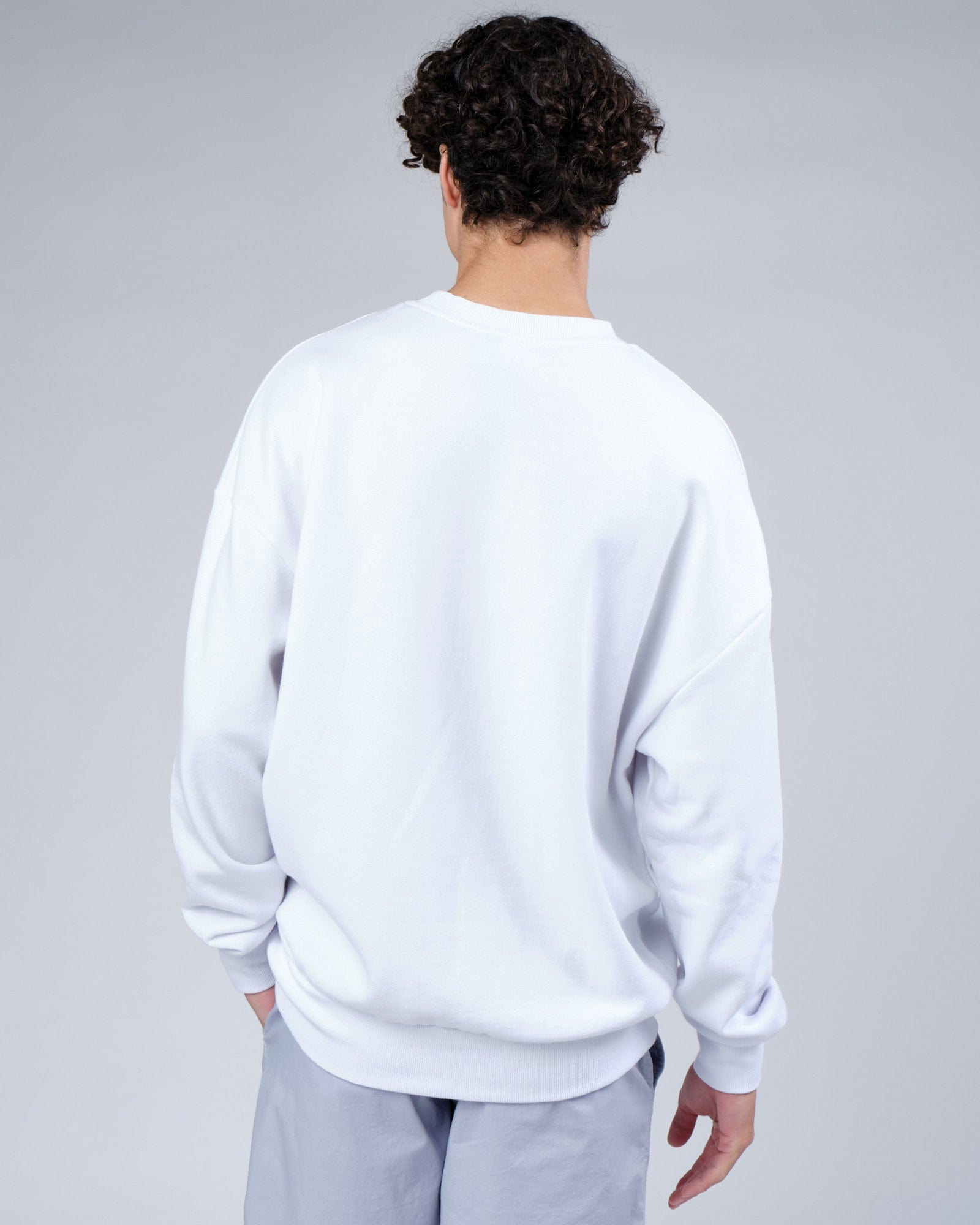 Model wearing Progress Sweater Oversize - White