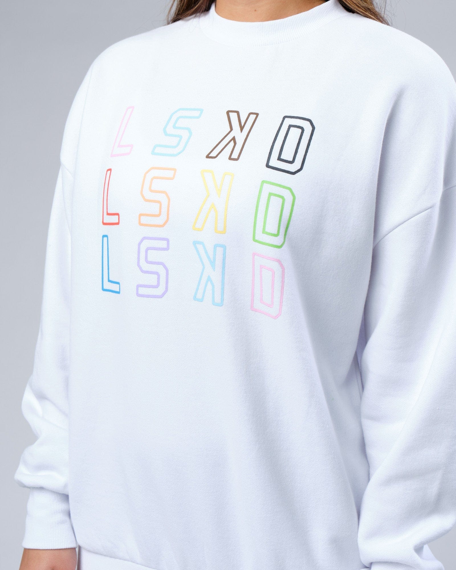 Model wearing Unisex Progress Sweater Oversize - White